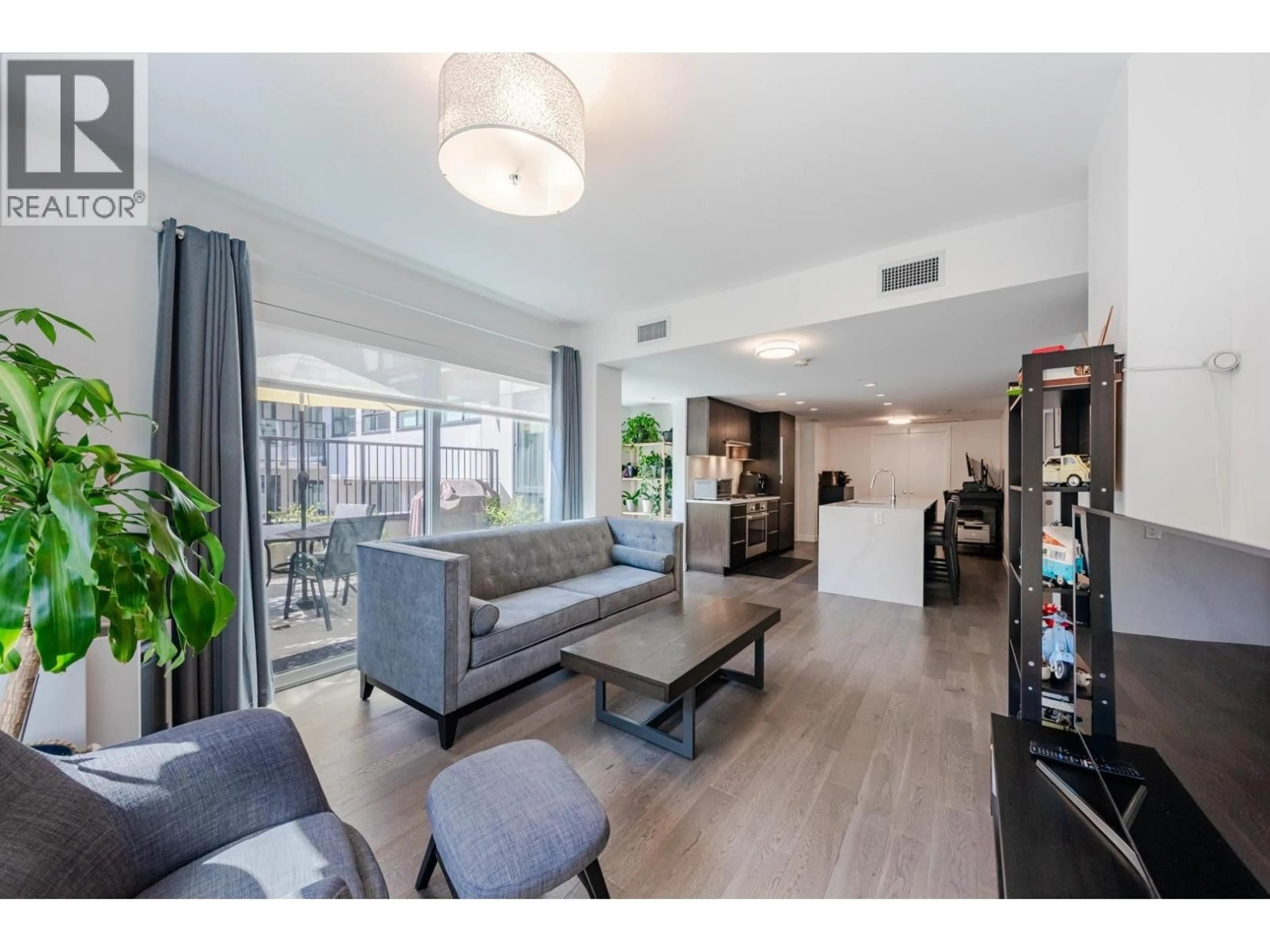 Living room with furniture, unknown for 104 - 7828 GRANVILLE STREET, Vancouver British Columbia V6P4Z2