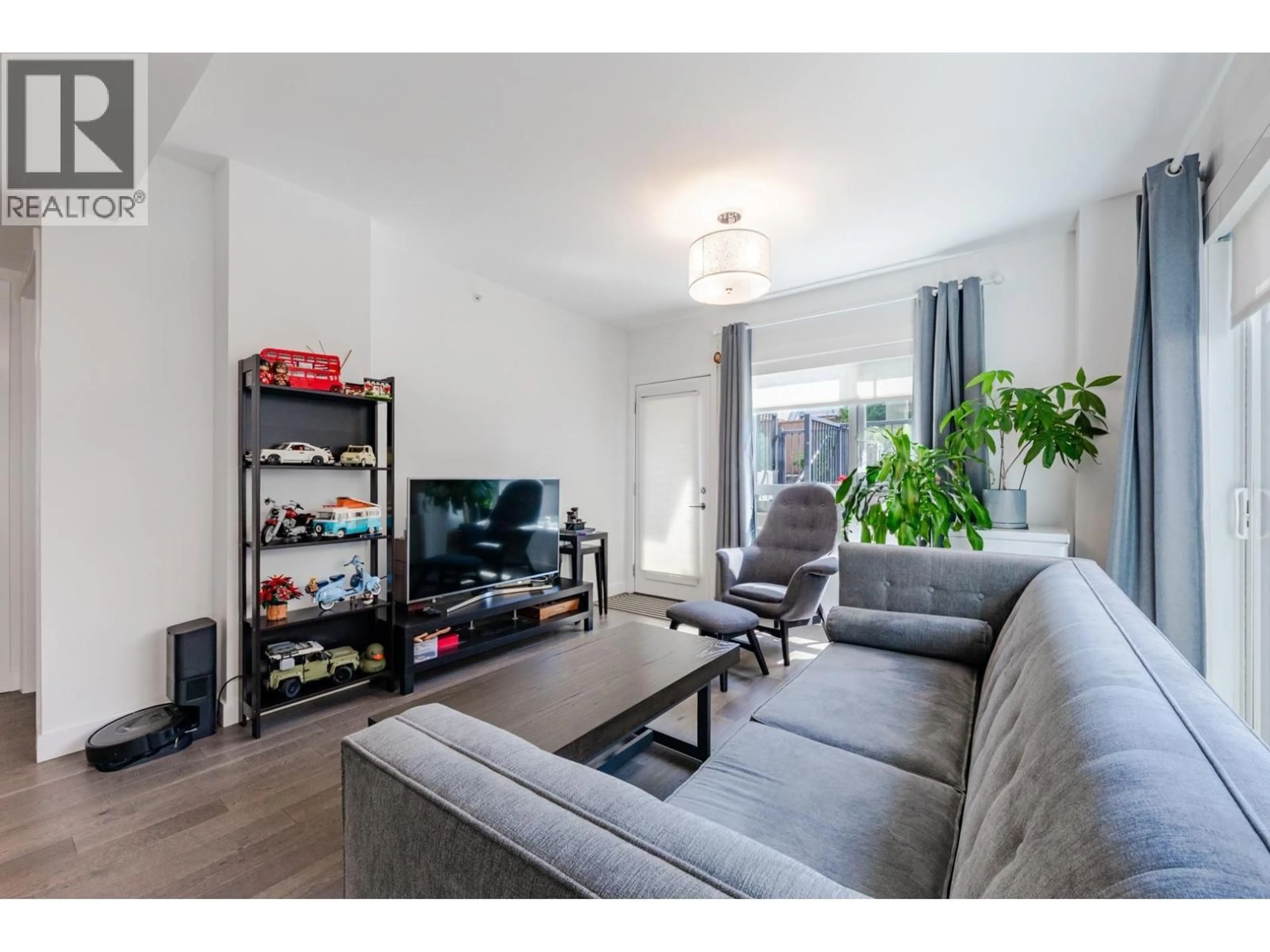 Living room with furniture, unknown for 104 - 7828 GRANVILLE STREET, Vancouver British Columbia V6P4Z2