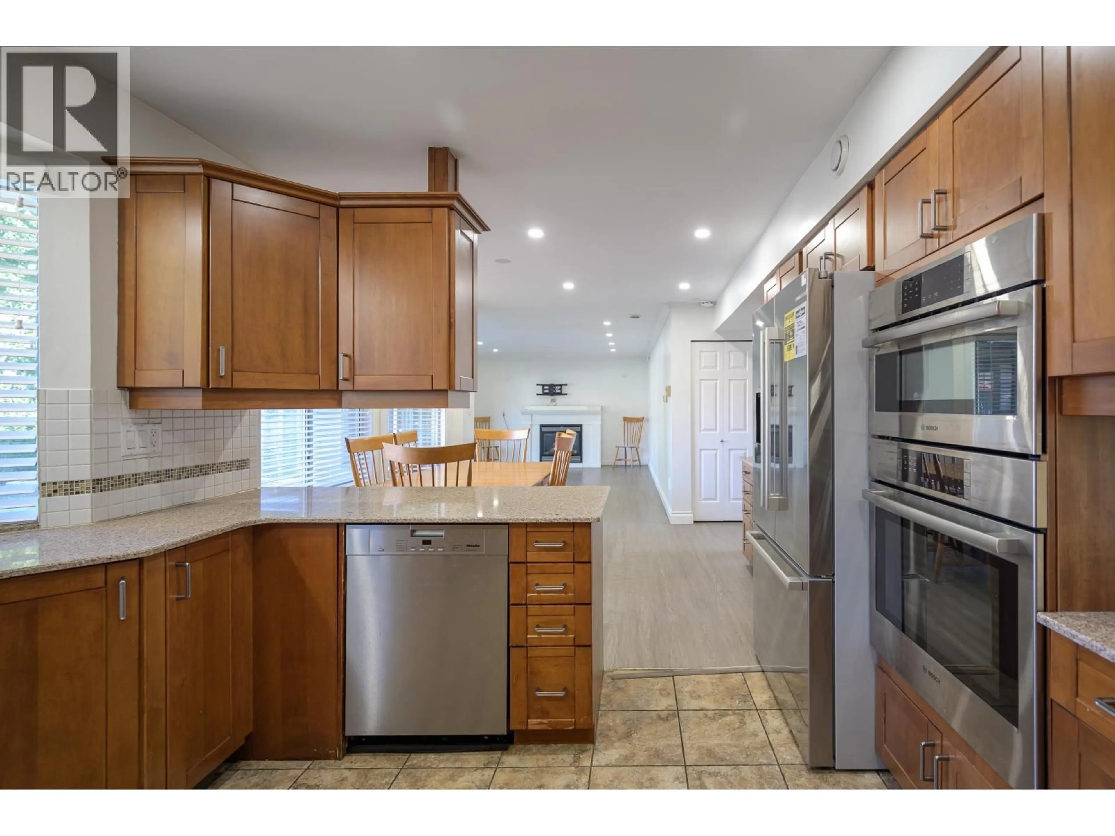 Open concept kitchen, ceramic/tile floor for 4430 50A STREET, Delta British Columbia V4K4M1