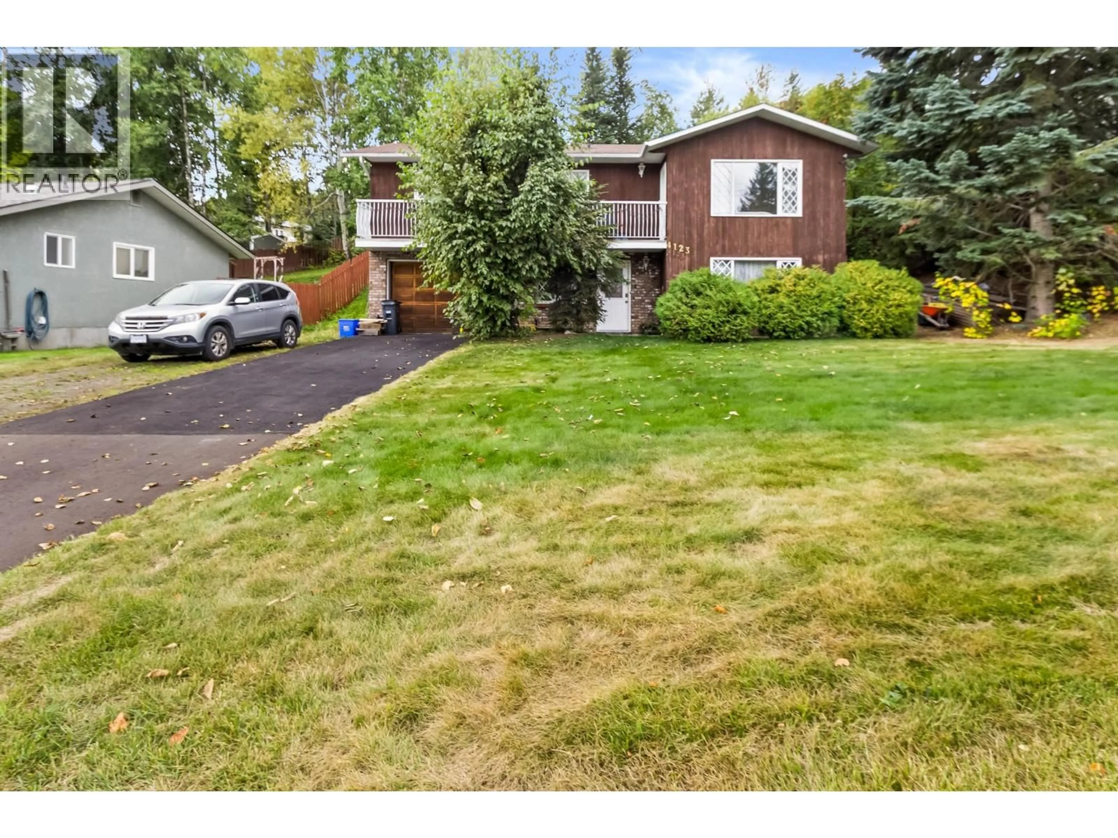 Home with vinyl exterior material, street for 4123 HIGHLAND DRIVE, Prince George British Columbia V2K2C4