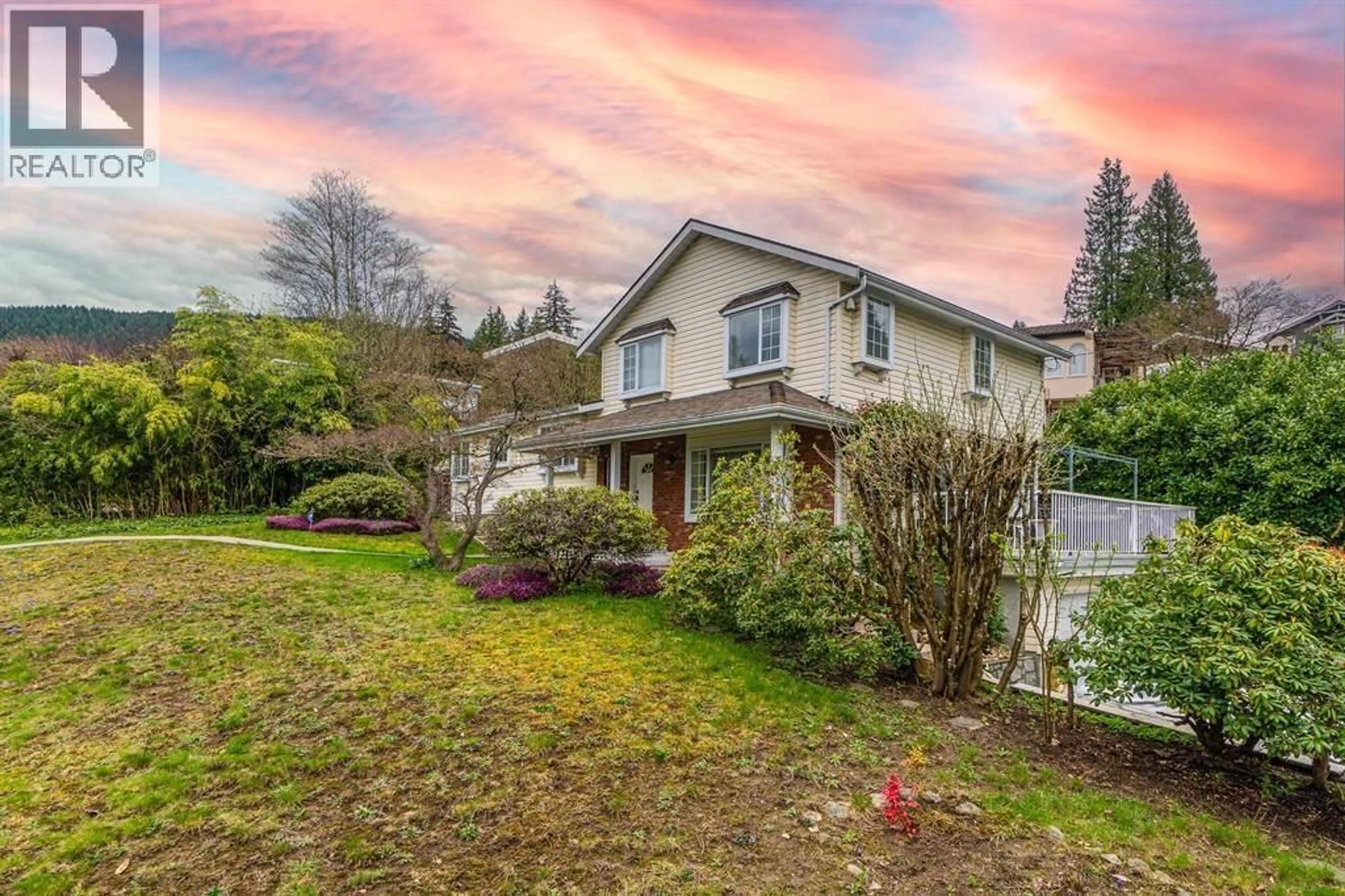A pic from outside/outdoor area/front of a property/back of a property/a pic from drone, mountain view for 100 KENSINGTON ROAD, North Vancouver British Columbia V7N1P1