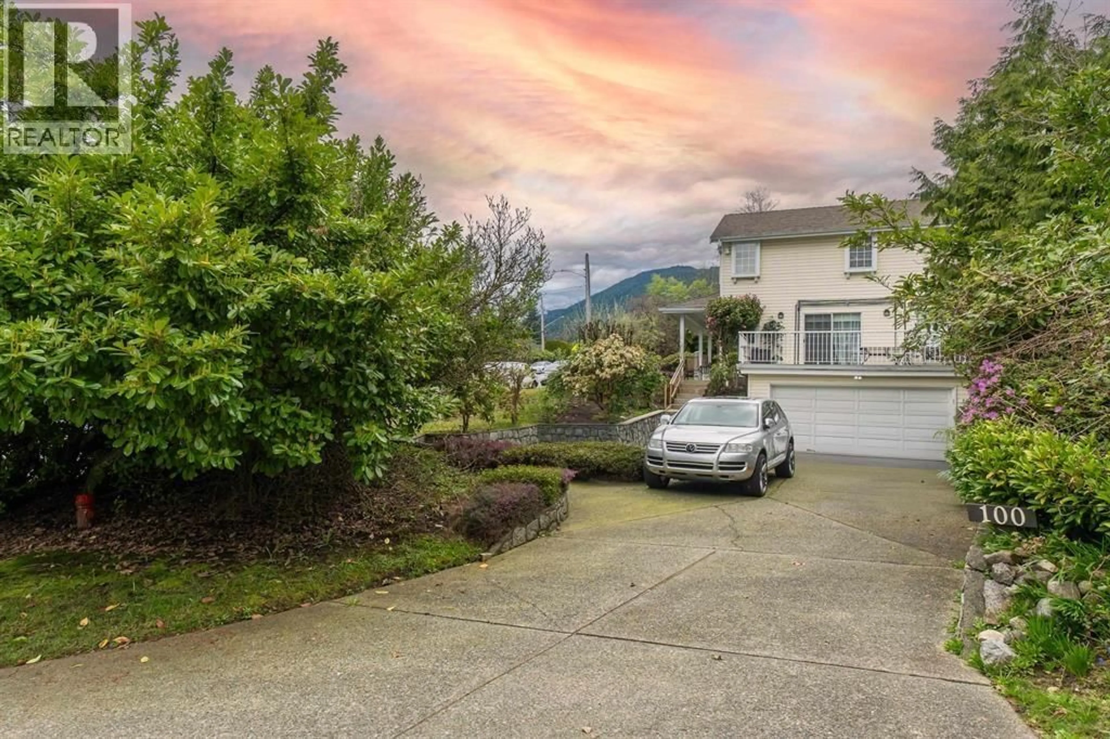 A pic from outside/outdoor area/front of a property/back of a property/a pic from drone, mountain view for 100 KENSINGTON ROAD, North Vancouver British Columbia V7N1P1