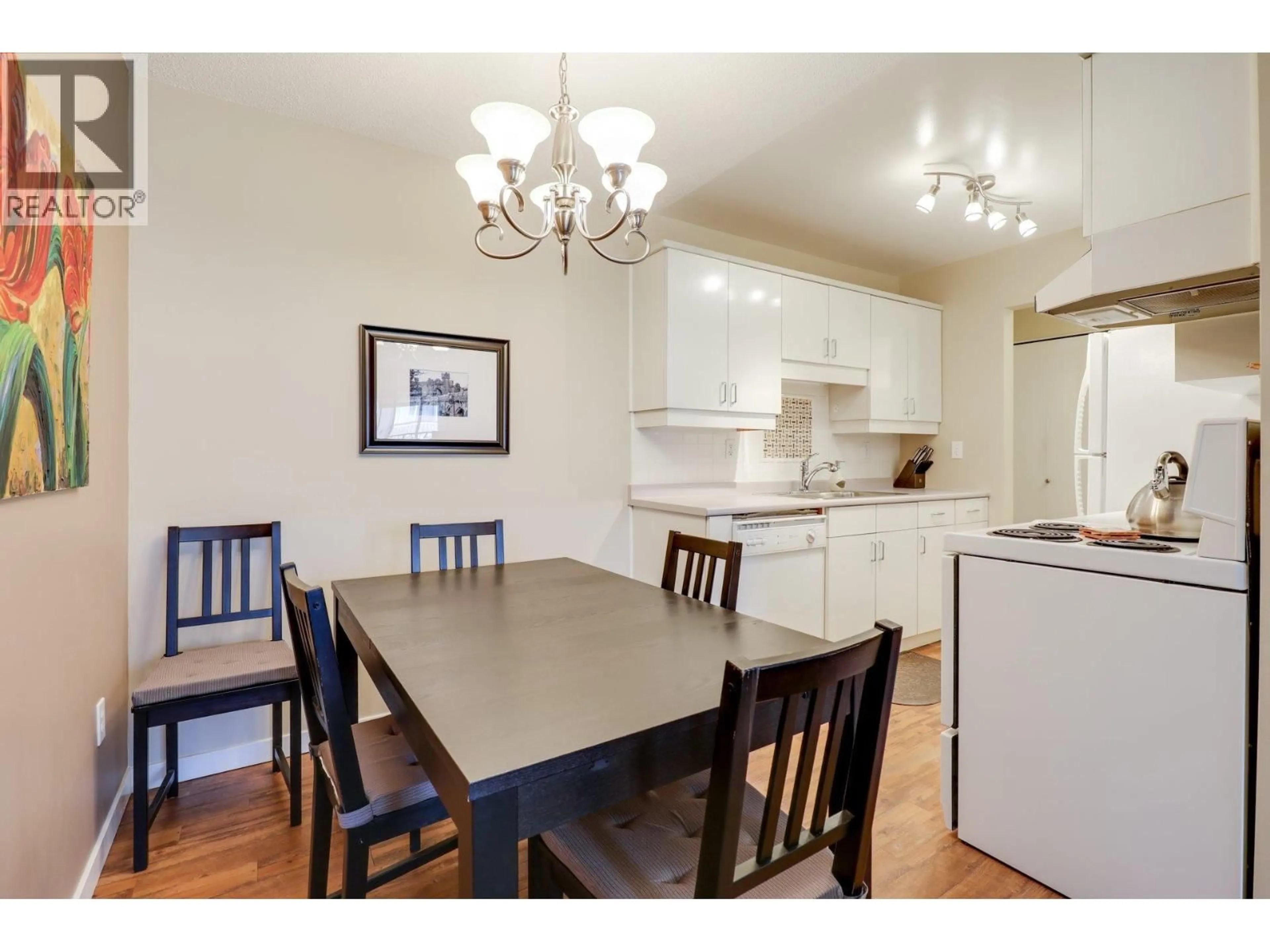 Open concept kitchen, wood/laminate floor for 302 - 330 1ST STREET, North Vancouver British Columbia V7L1B5