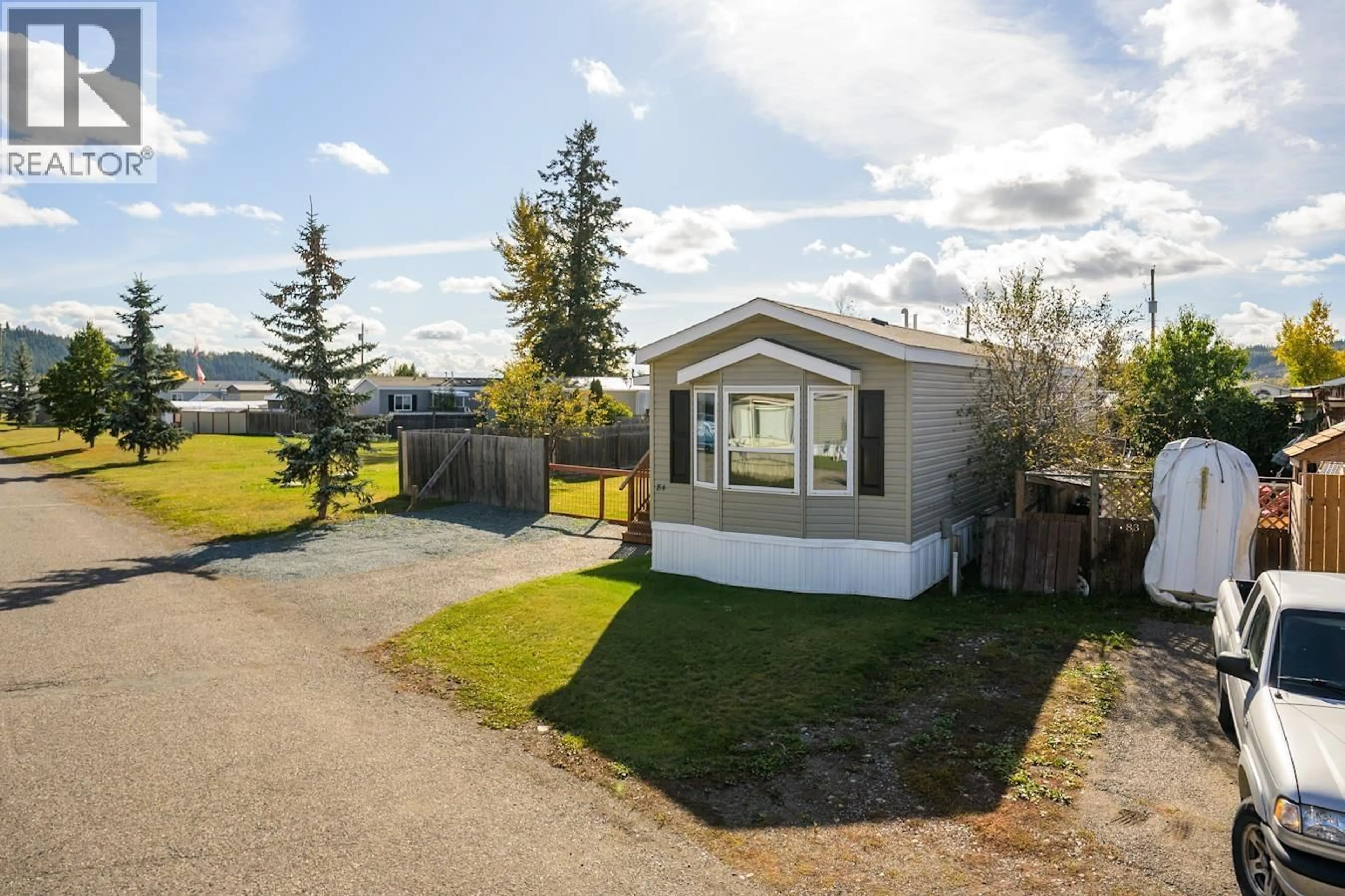A pic from outside/outdoor area/front of a property/back of a property/a pic from drone, street for 84 - 5125 NORTH NECHAKO ROAD, Prince George British Columbia V2K4V7