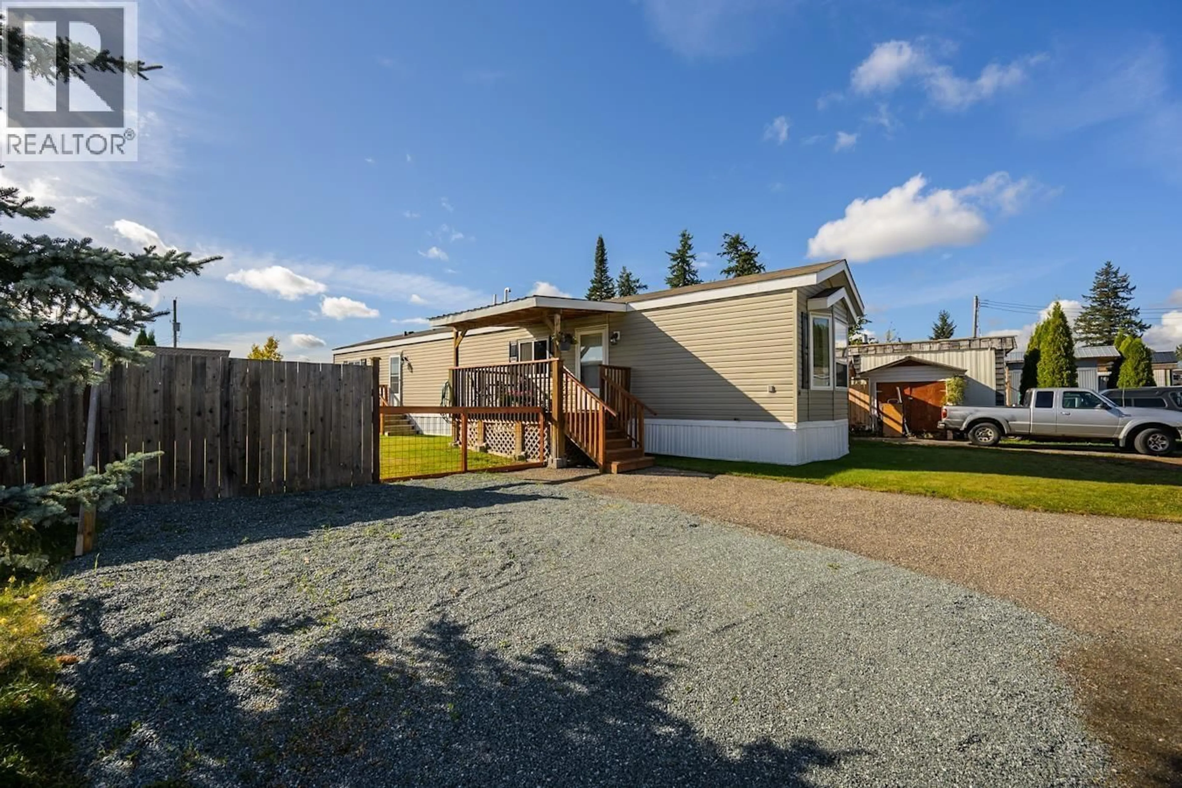 A pic from outside/outdoor area/front of a property/back of a property/a pic from drone, street for 84 - 5125 NORTH NECHAKO ROAD, Prince George British Columbia V2K4V7