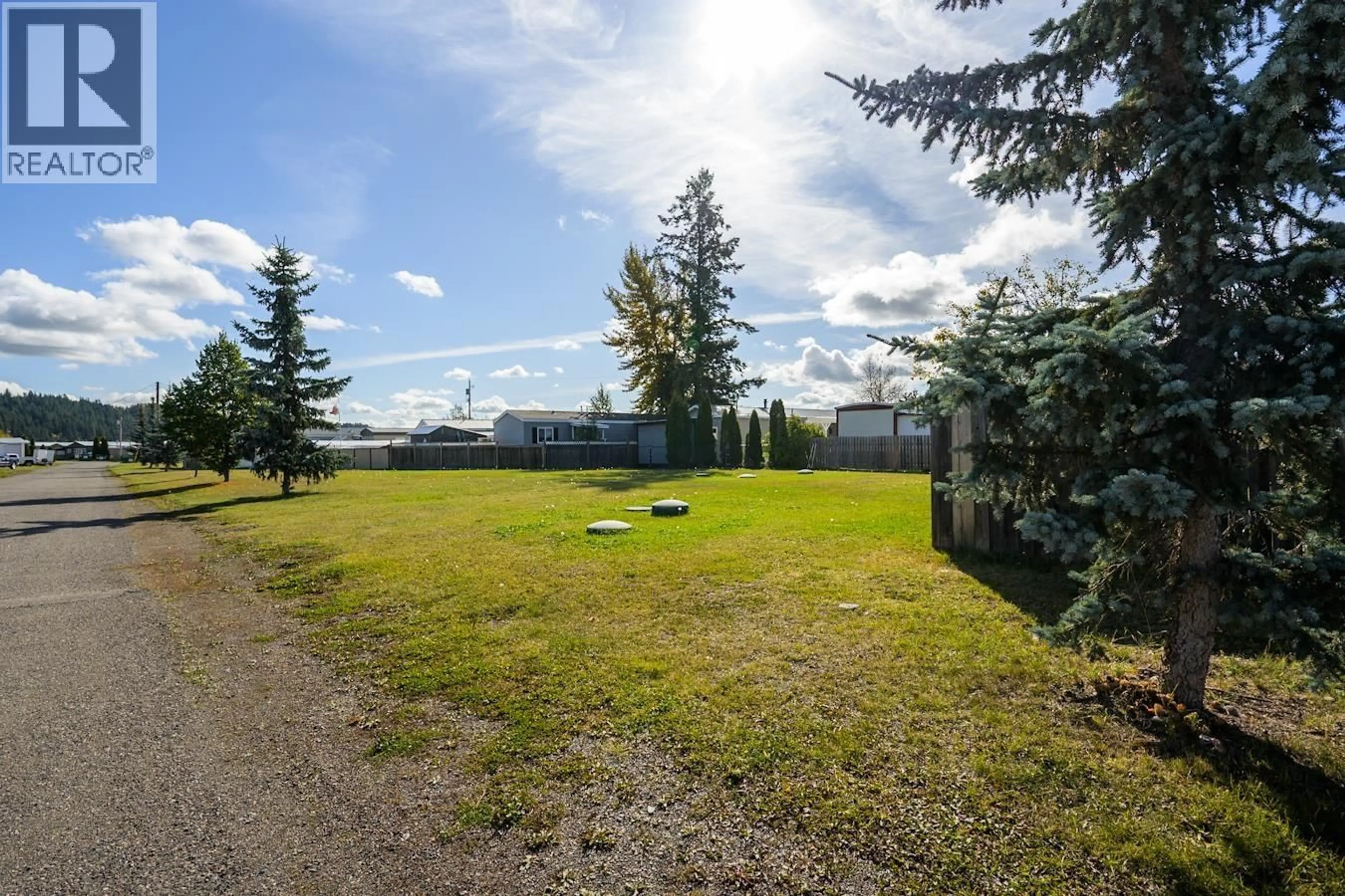 A pic from outside/outdoor area/front of a property/back of a property/a pic from drone, unknown for 84 - 5125 NORTH NECHAKO ROAD, Prince George British Columbia V2K4V7