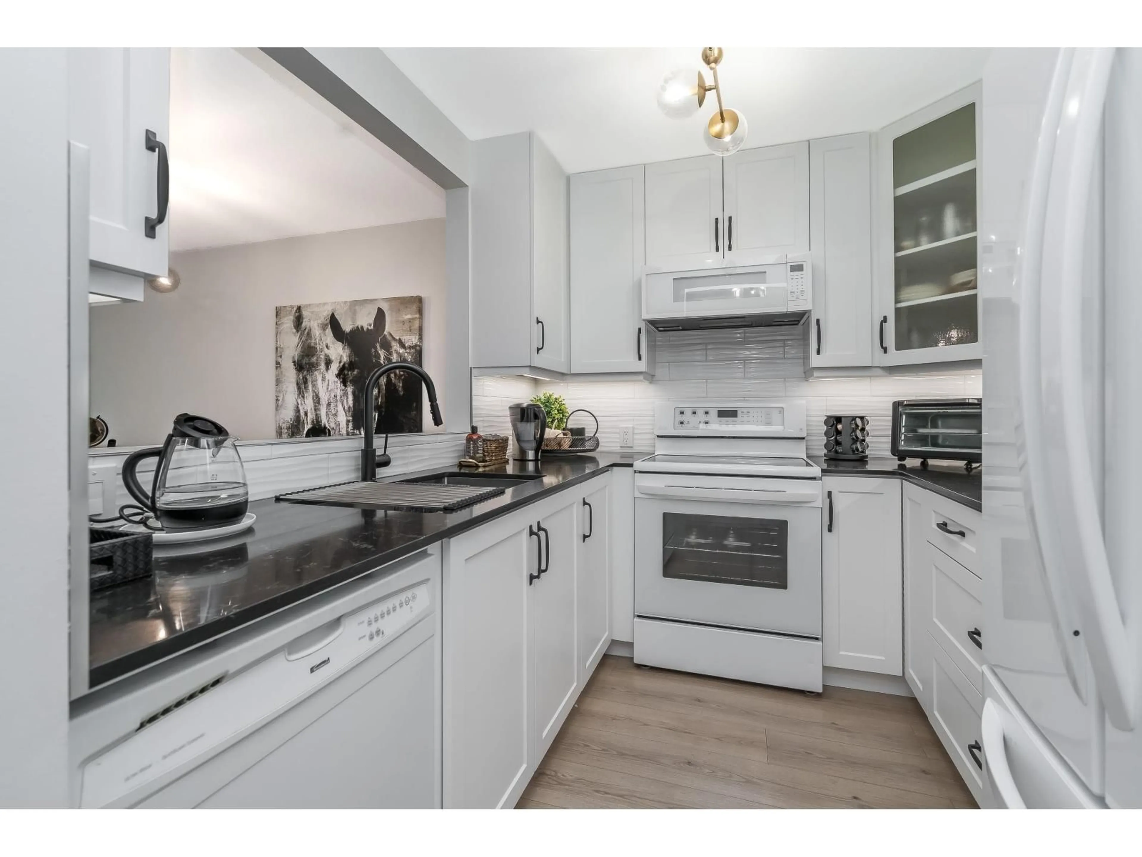 Open concept kitchen, unknown for 102 - 20448 PARK, Langley British Columbia V3A4N8
