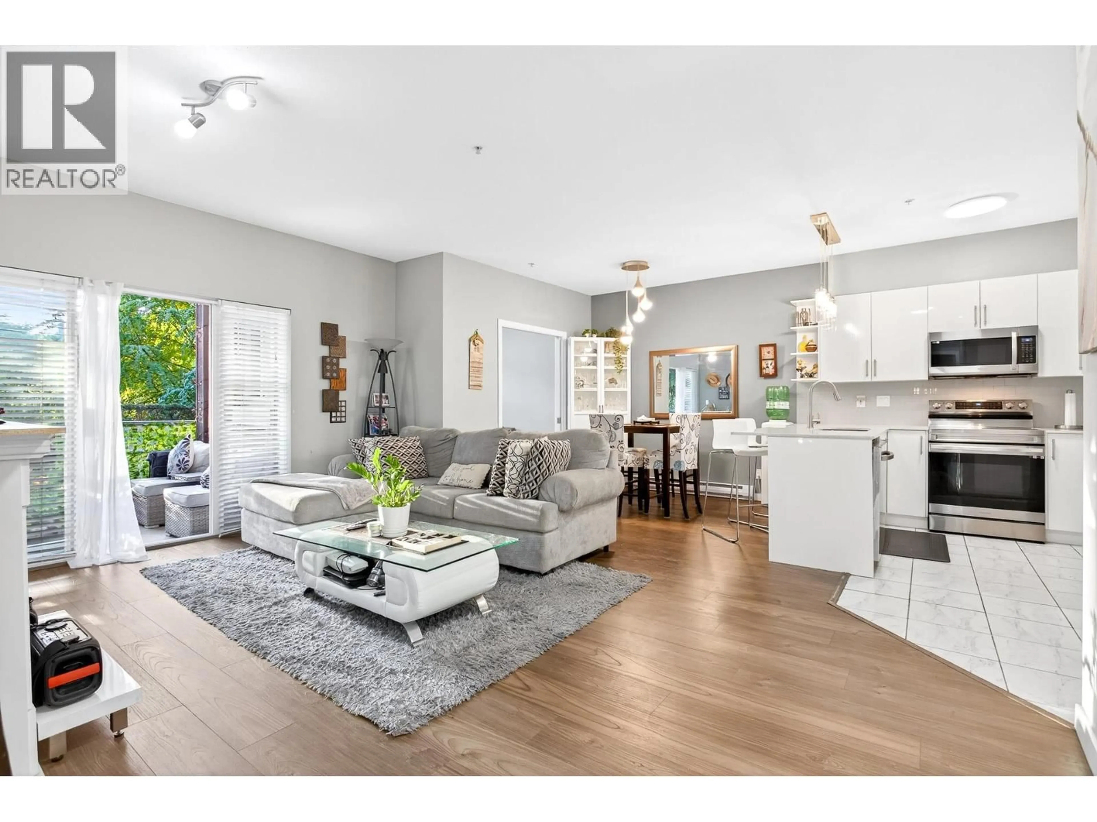 Open concept kitchen, wood/laminate floor for 209 - 2488 KELLY AVENUE, Port Coquitlam British Columbia V3C1Y4
