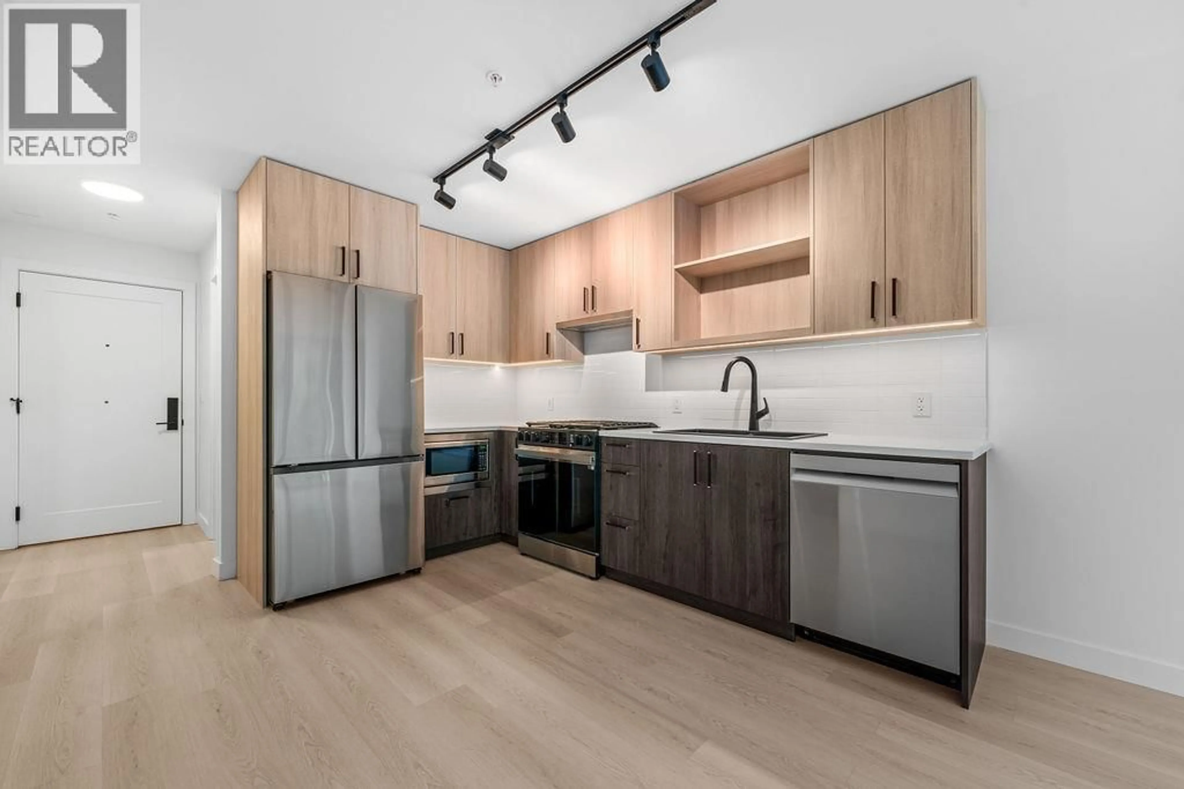 Standard kitchen, wood/laminate floor for 402 - 1100 CLARKE ROAD, Port Moody British Columbia V3H0N3