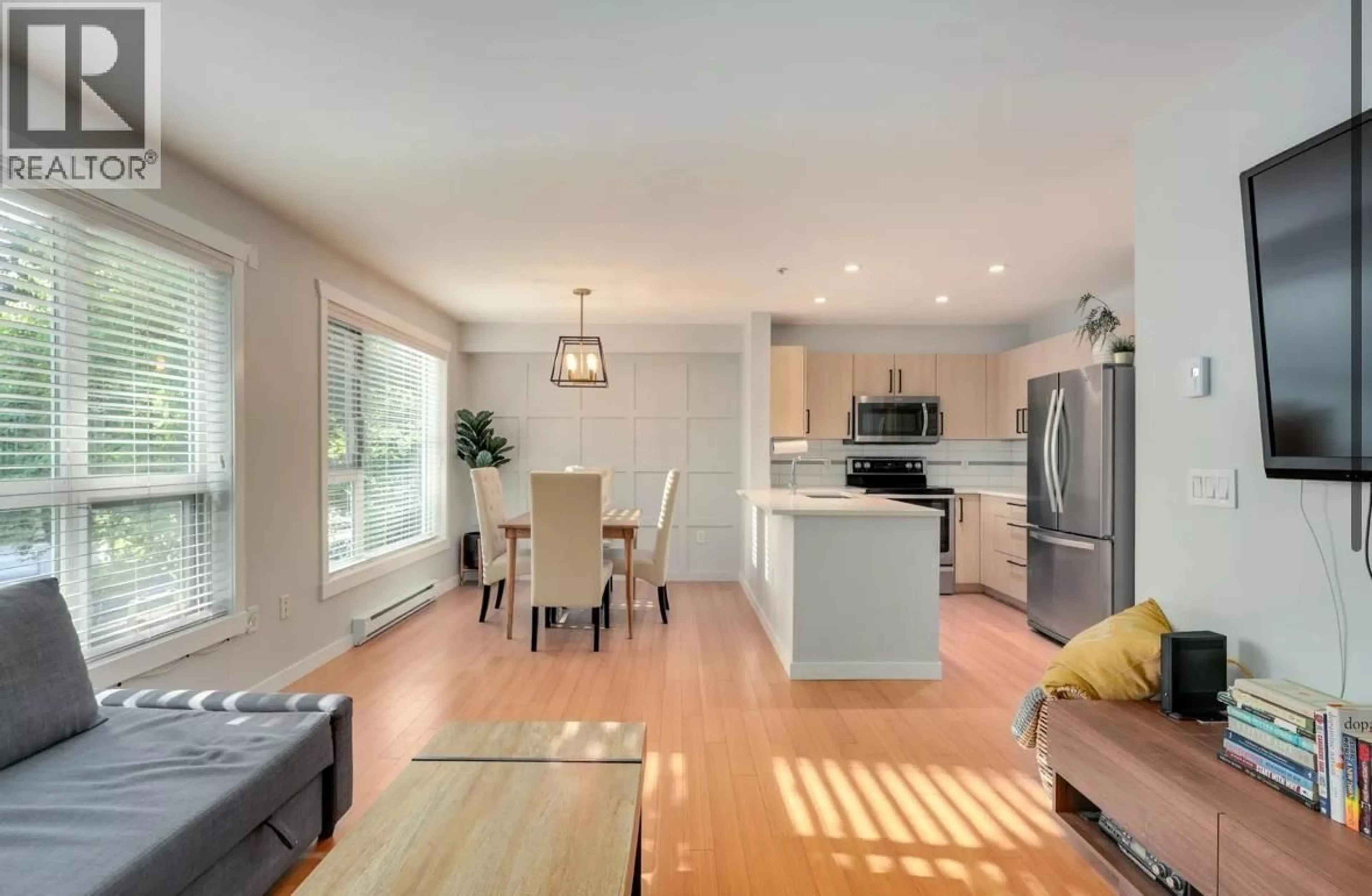 Open concept kitchen, wood/laminate floor for 212 - 3575 EUCLID AVENUE, Vancouver British Columbia V5R6H5