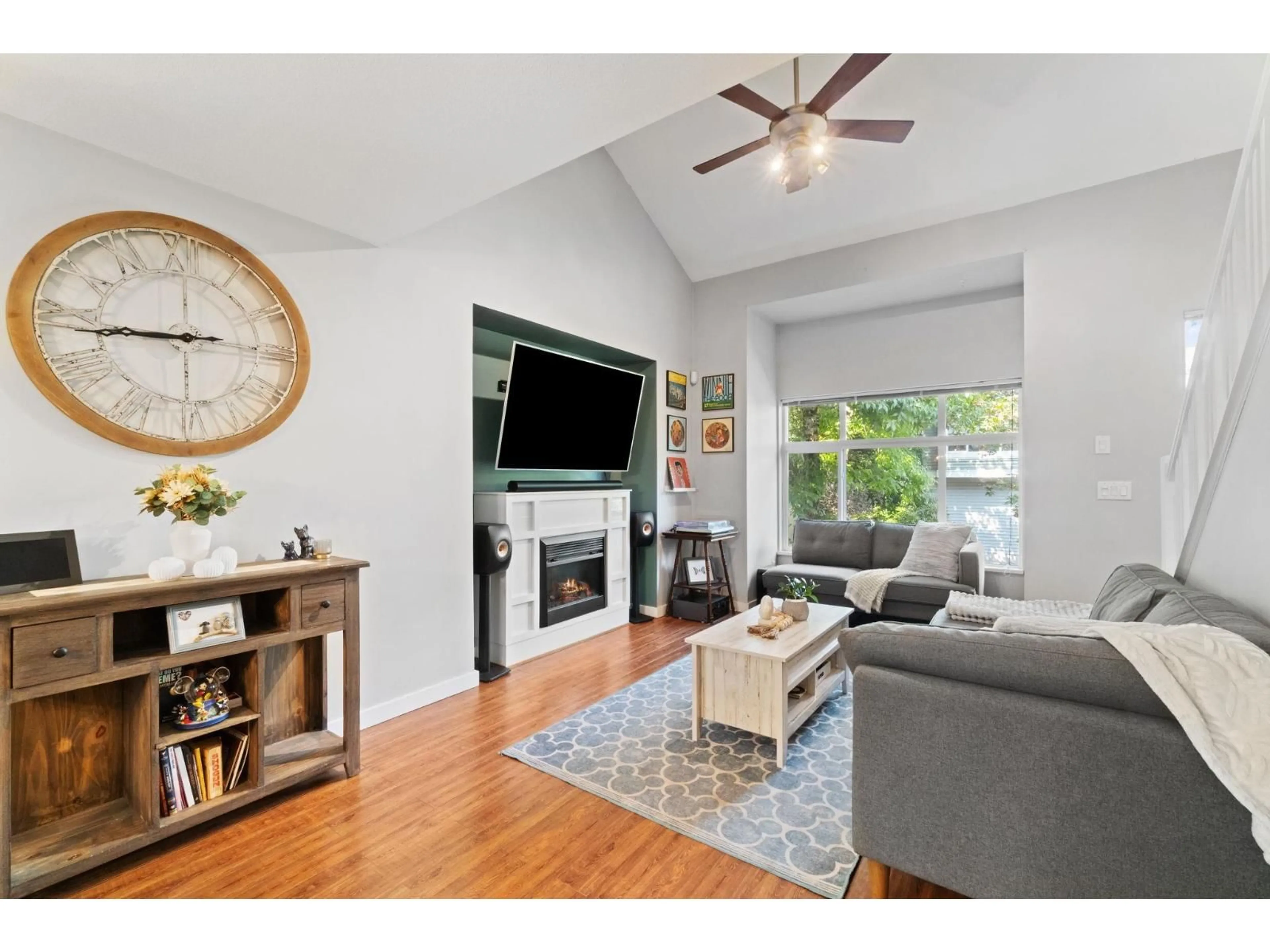 Living room with furniture, wood/laminate floor for 154 - 20033 70, Langley British Columbia V2Y3A2