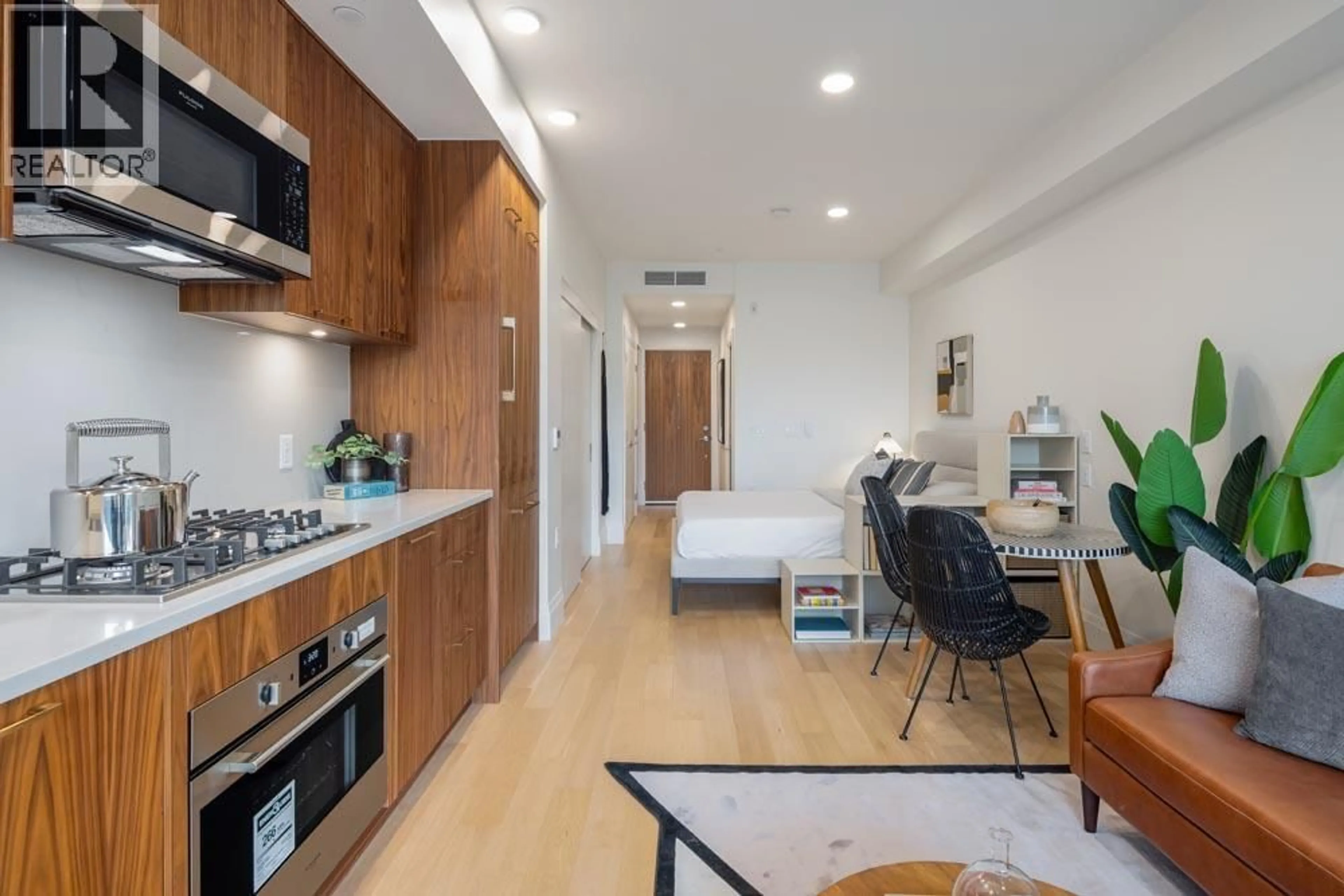 Open concept kitchen, unknown for 407 - 2550 GARDEN DRIVE, Vancouver British Columbia V5N4X6