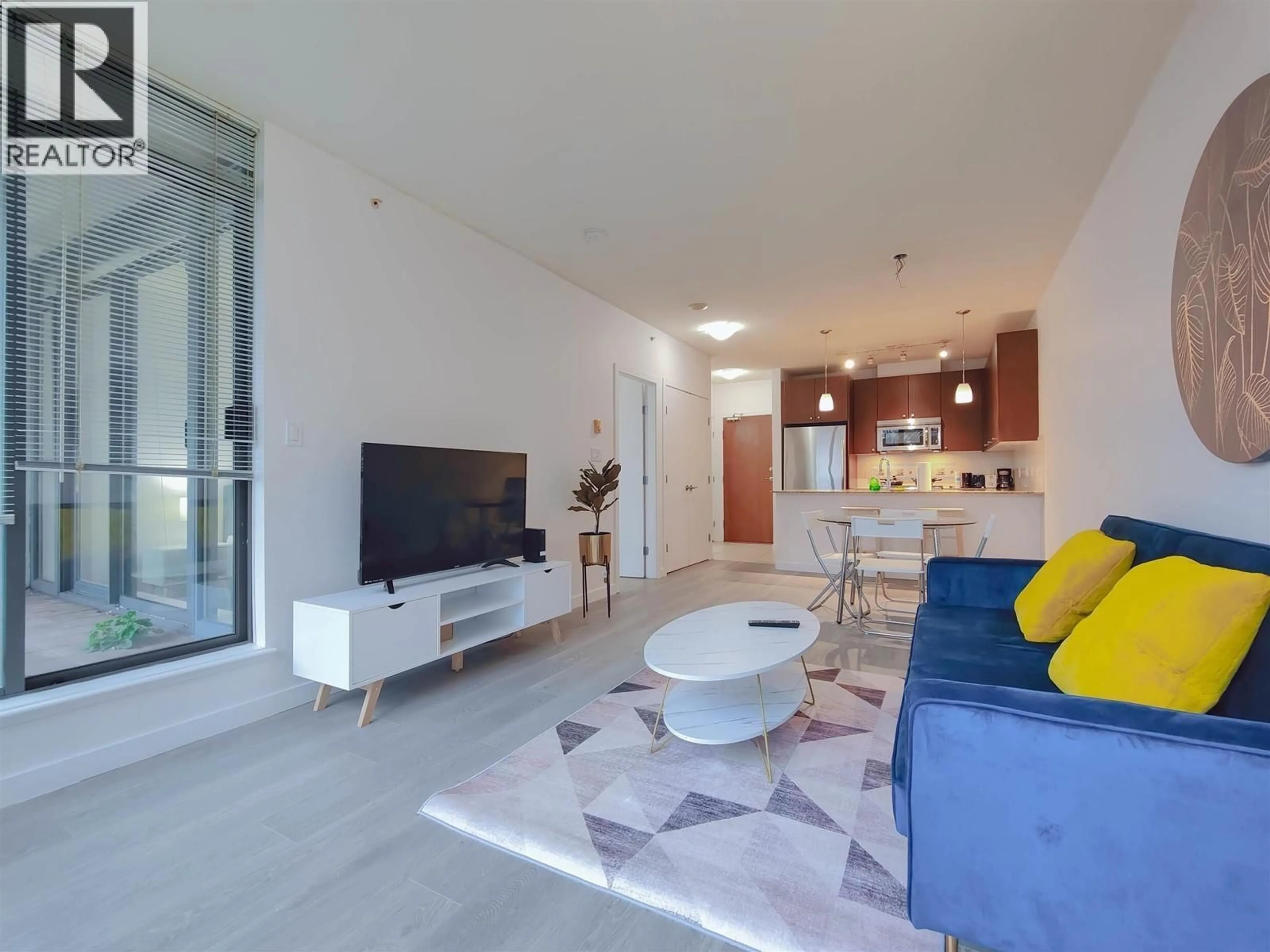 Living room with furniture, unknown for 502 - 7360 ELMBRIDGE WAY, Richmond British Columbia V6X0A5