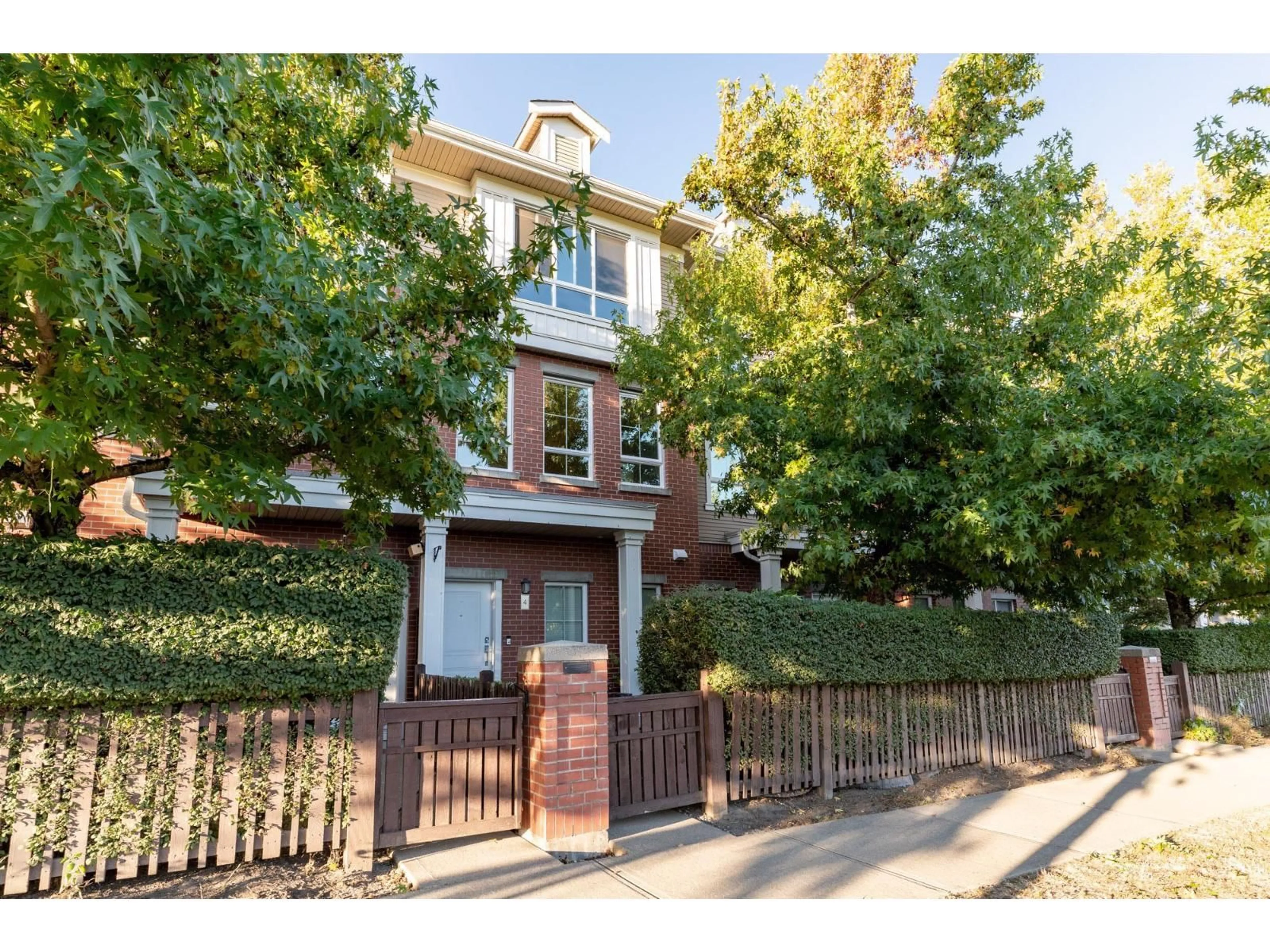 Home with brick exterior material, street for 4 - 19505 68A, Surrey British Columbia V4N6K3