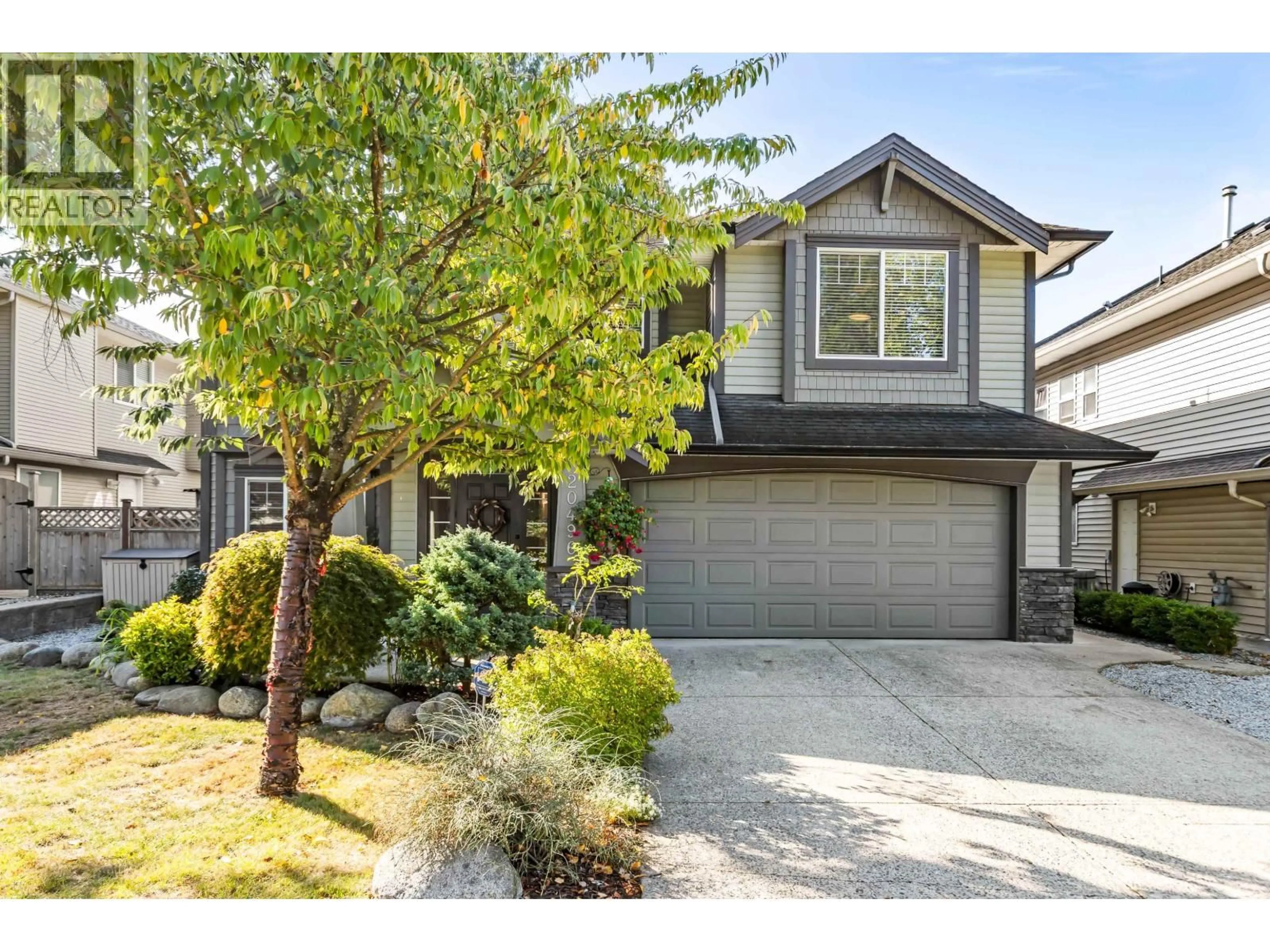 Home with vinyl exterior material, street for 20496 123 AVENUE, Maple Ridge British Columbia V2X4A7