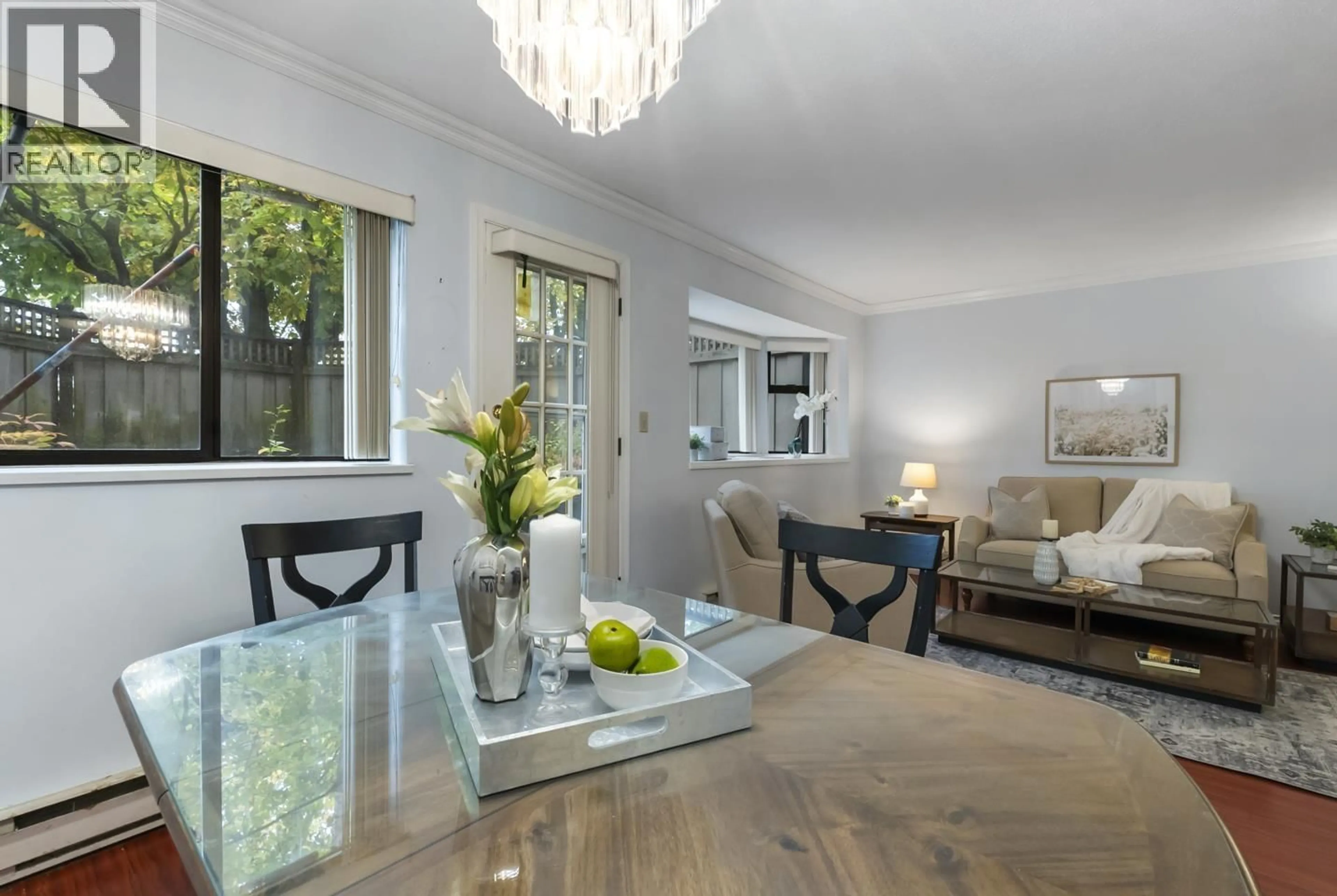 Dining room, wood/laminate floor for 103 - 777 EIGHTH STREET, New Westminster British Columbia V3N3S7