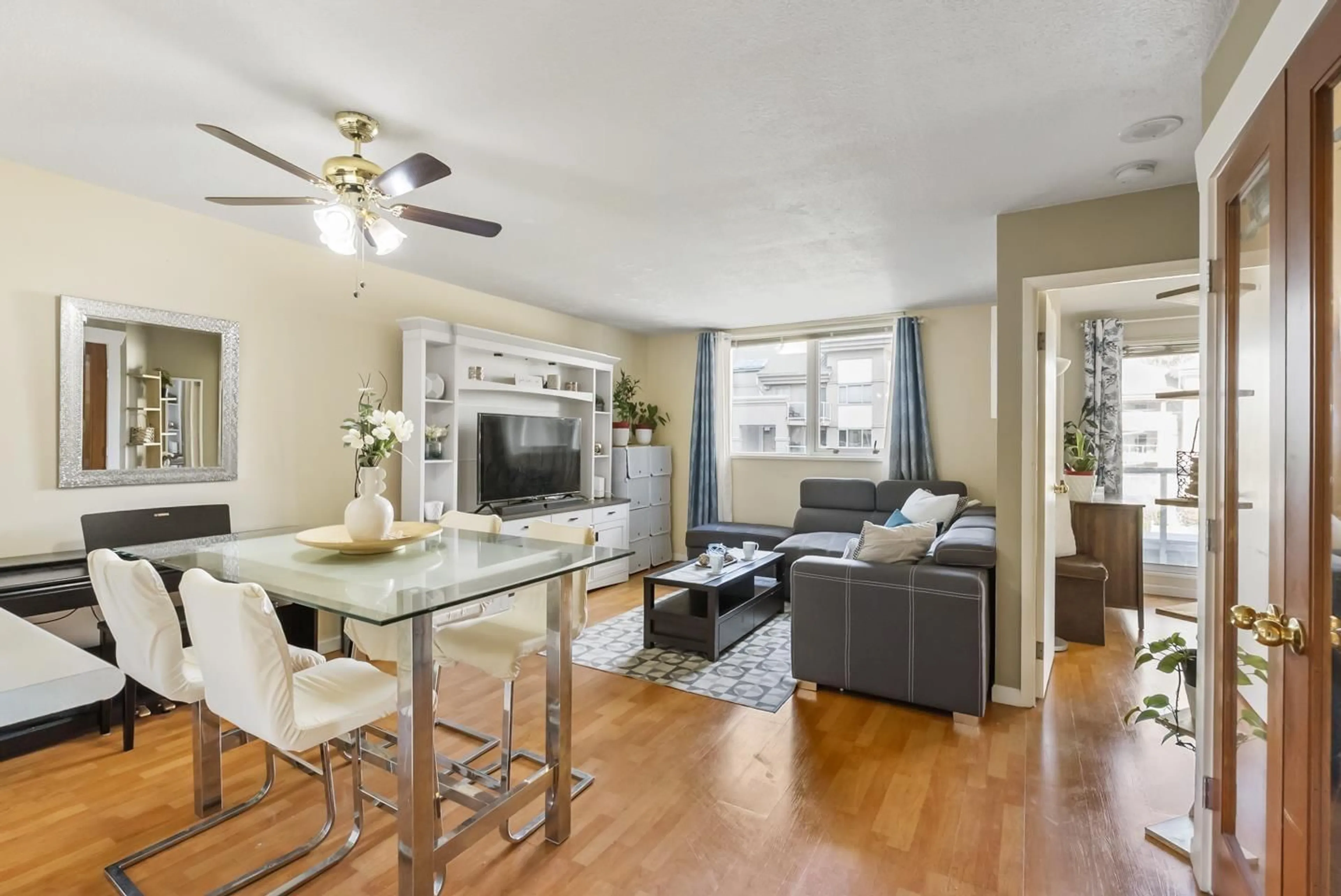 Living room with furniture, wood/laminate floor for 304 - 10523 UNIVERSITY, Surrey British Columbia V3T5T8