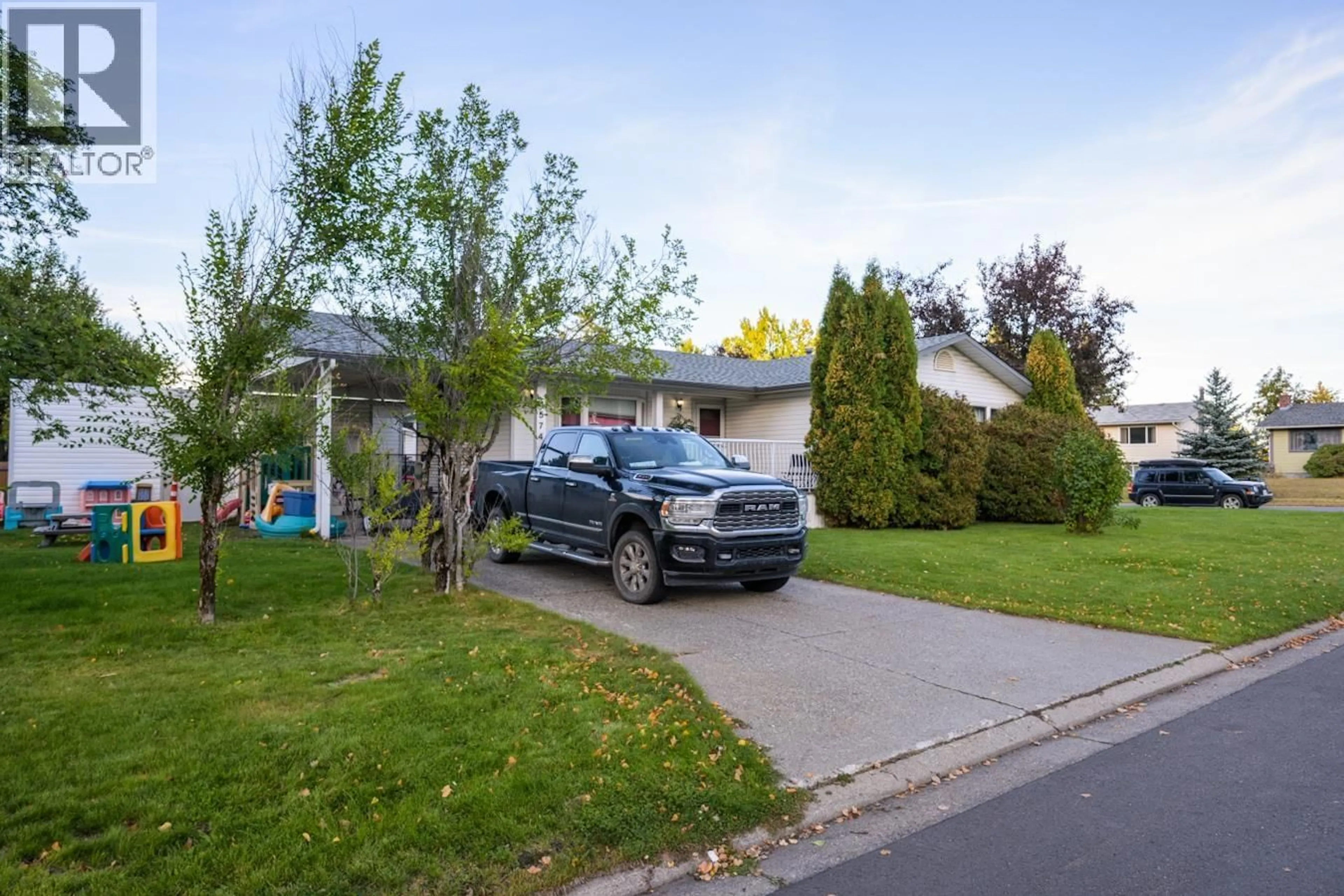 Home with vinyl exterior material, street for 4574 VALLEY CRESCENT, Prince George British Columbia V2M5M1