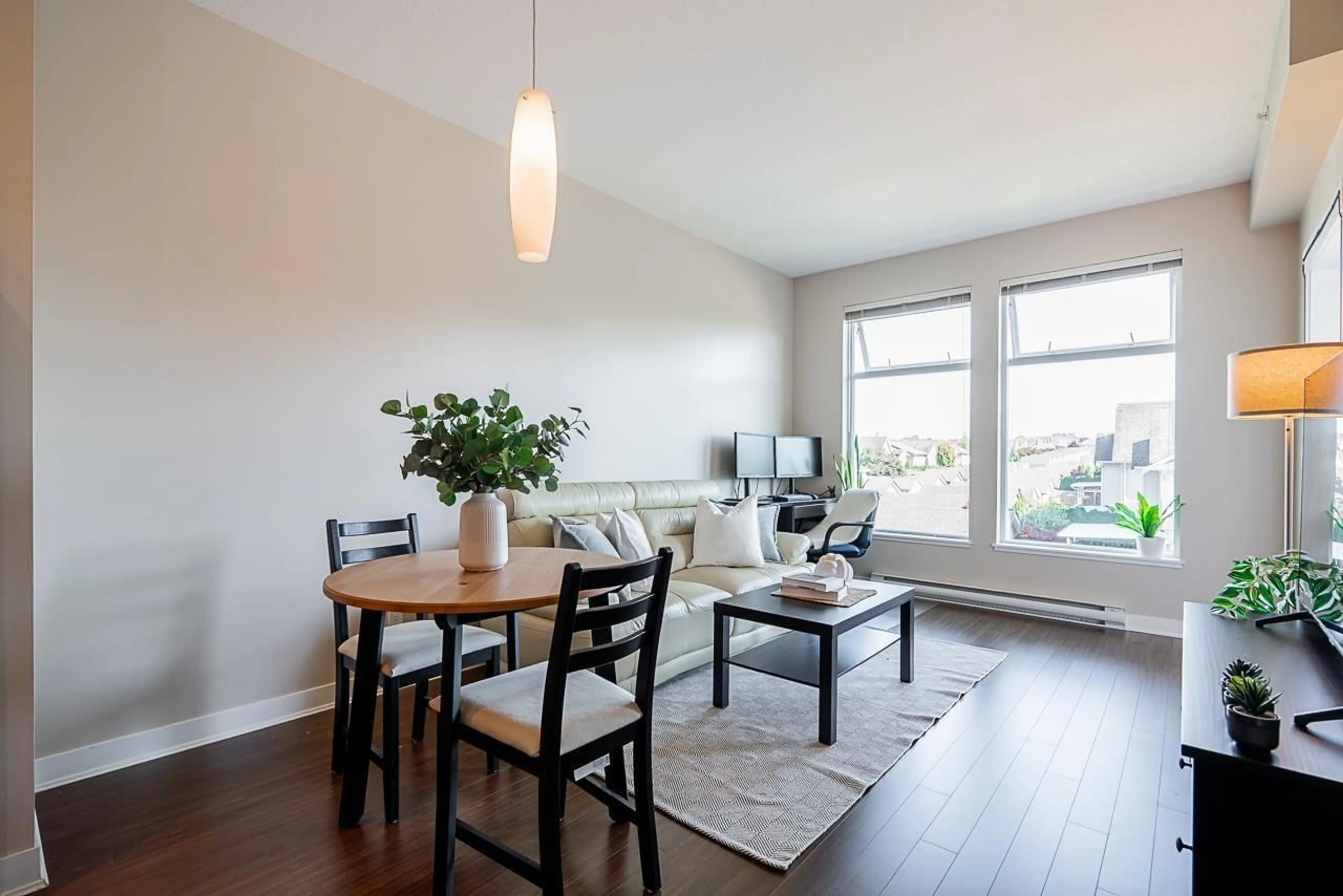 Dining room, wood/laminate floor for 309 - 18818 68, Surrey British Columbia V4N6K2