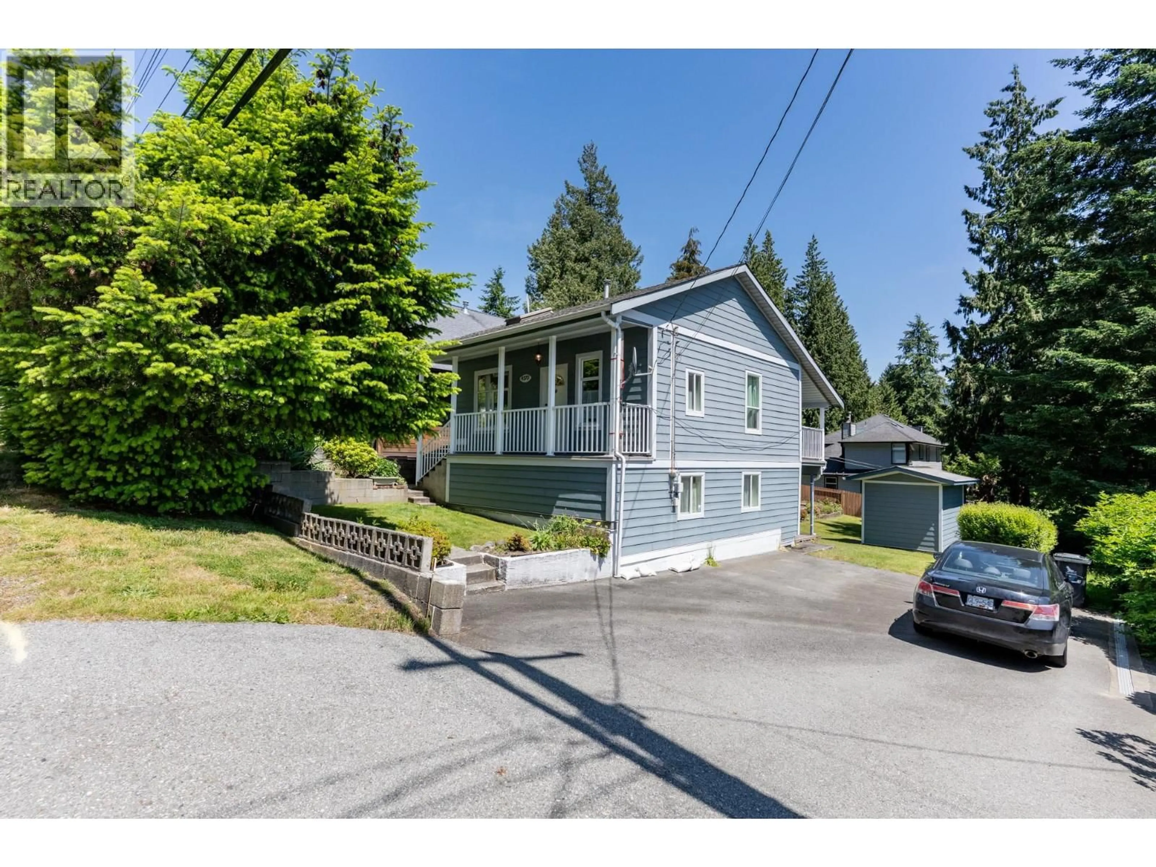 A pic from outside/outdoor area/front of a property/back of a property/a pic from drone, street for 4370 MOUNTAIN HIGHWAY, North Vancouver British Columbia V7K2K2