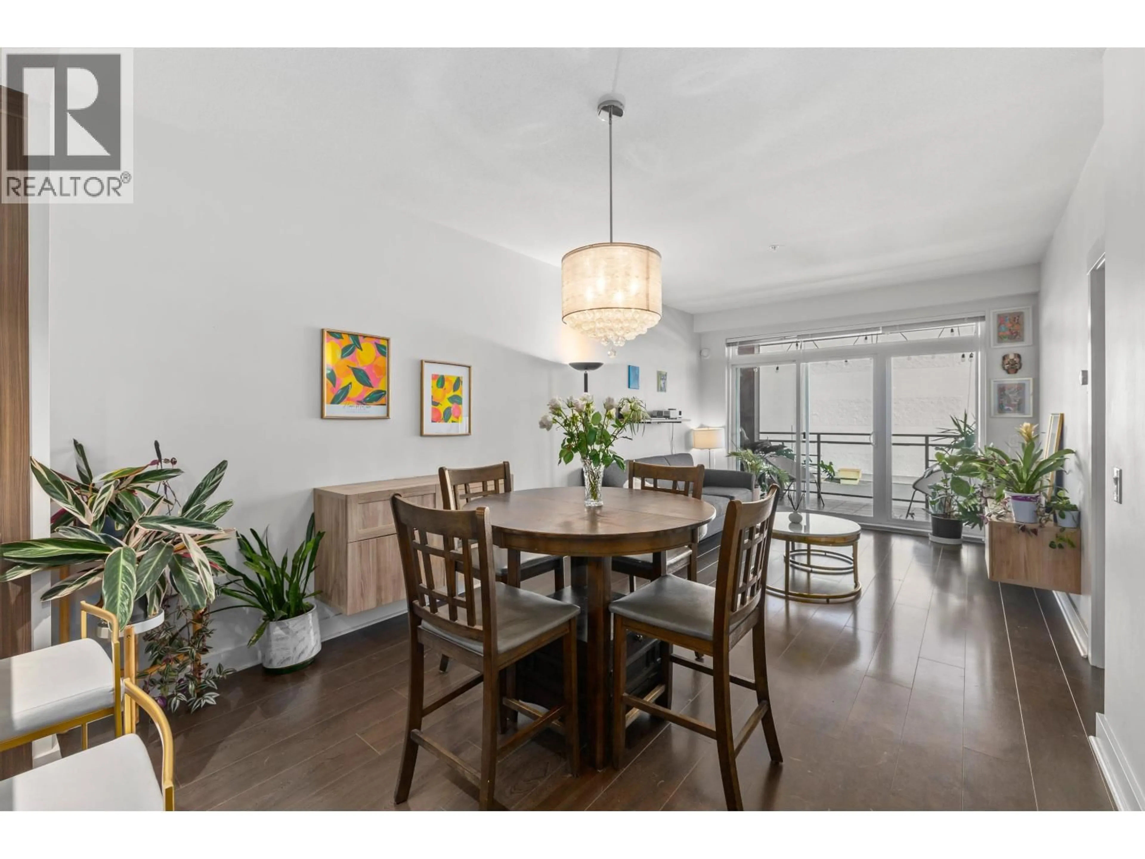 Dining room, wood/laminate floor for 305 - 733 14TH STREET, North Vancouver British Columbia V7M0C6