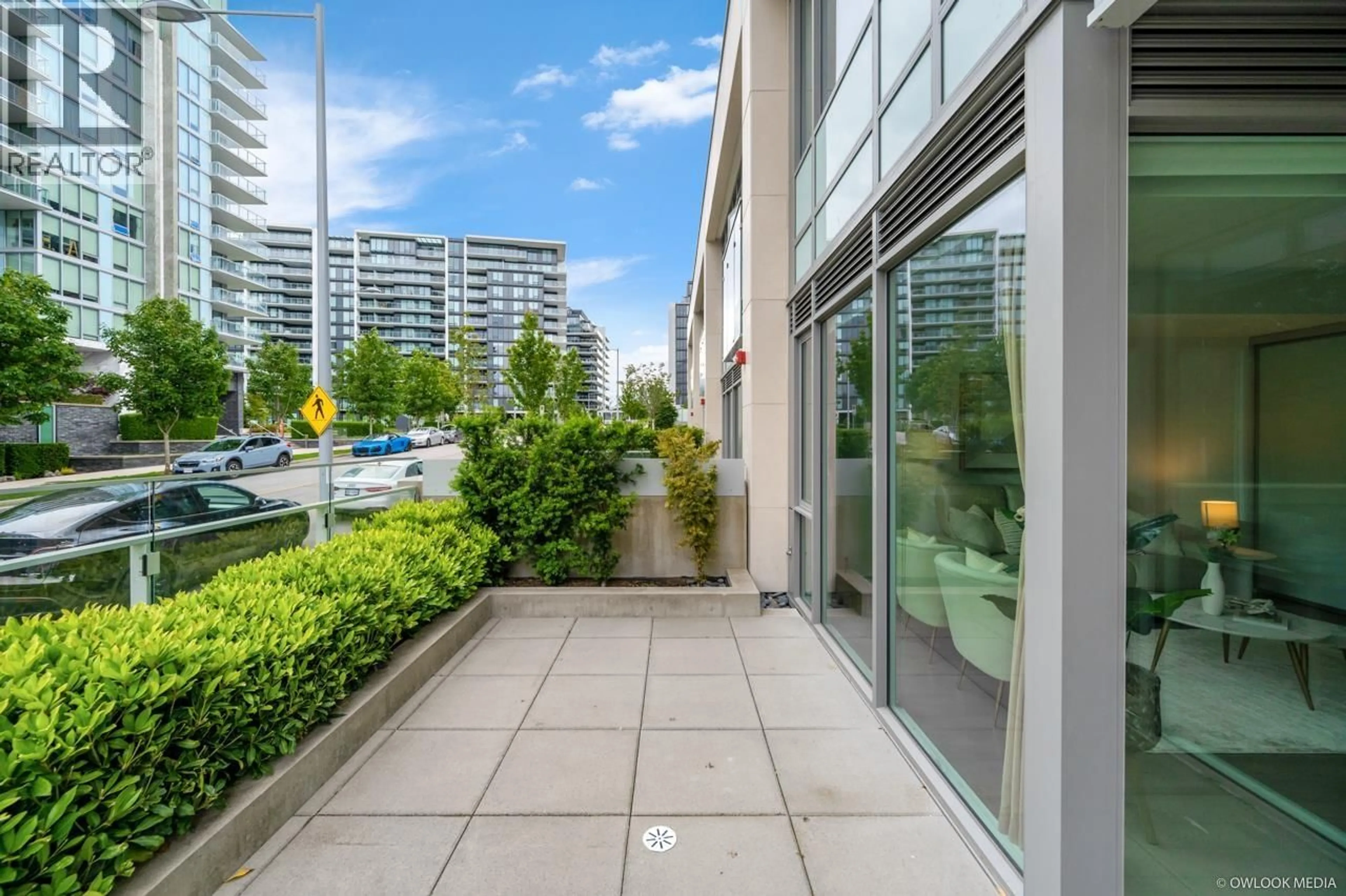 Patio, city buildings view from balcony for 105 - 6622 PEARSON WAY, Richmond British Columbia V7C0E4