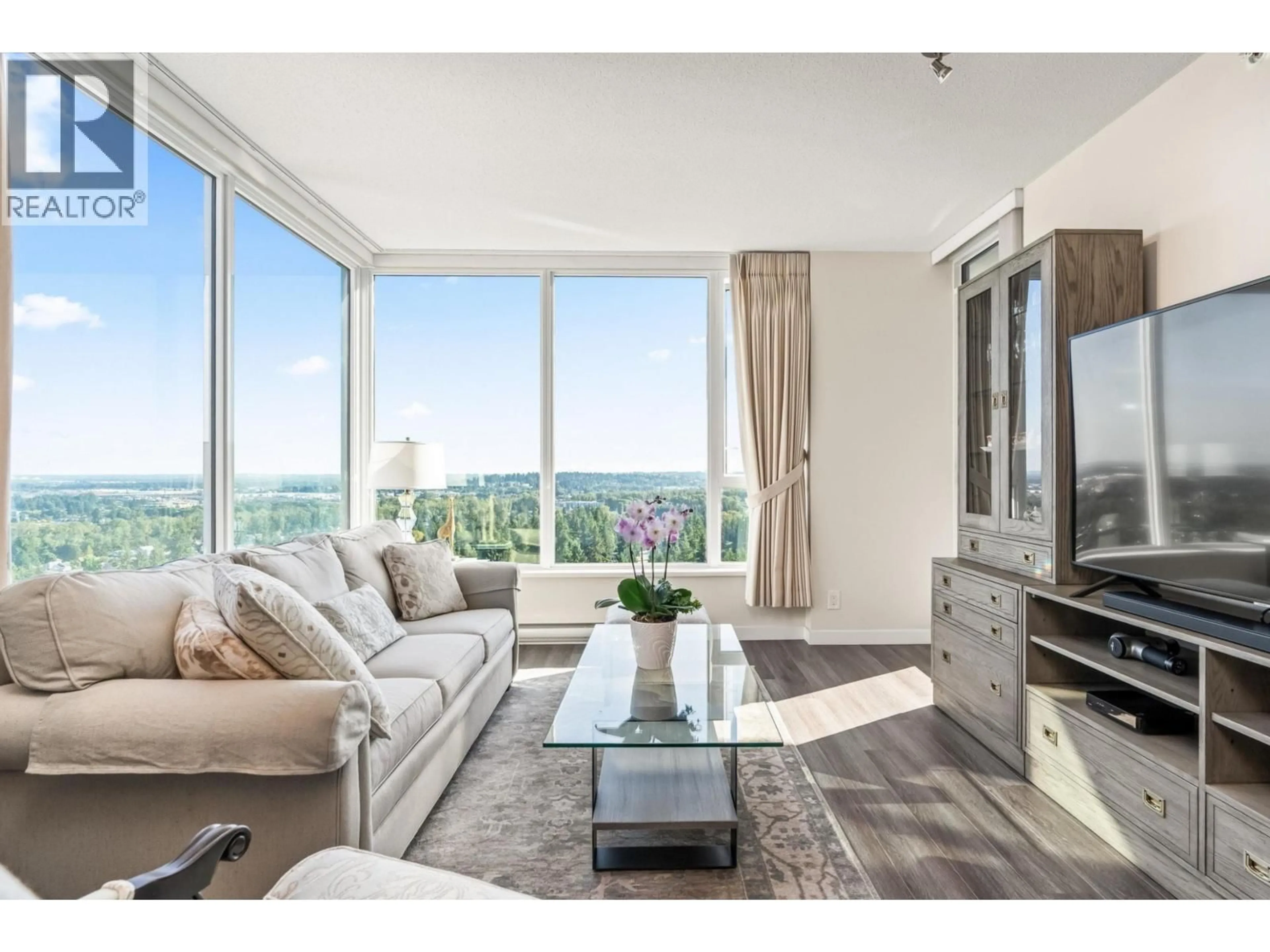 Living room with furniture, wood/laminate floor for 2401 - 3100 WINDSOR GATE, Coquitlam British Columbia V3B0P3