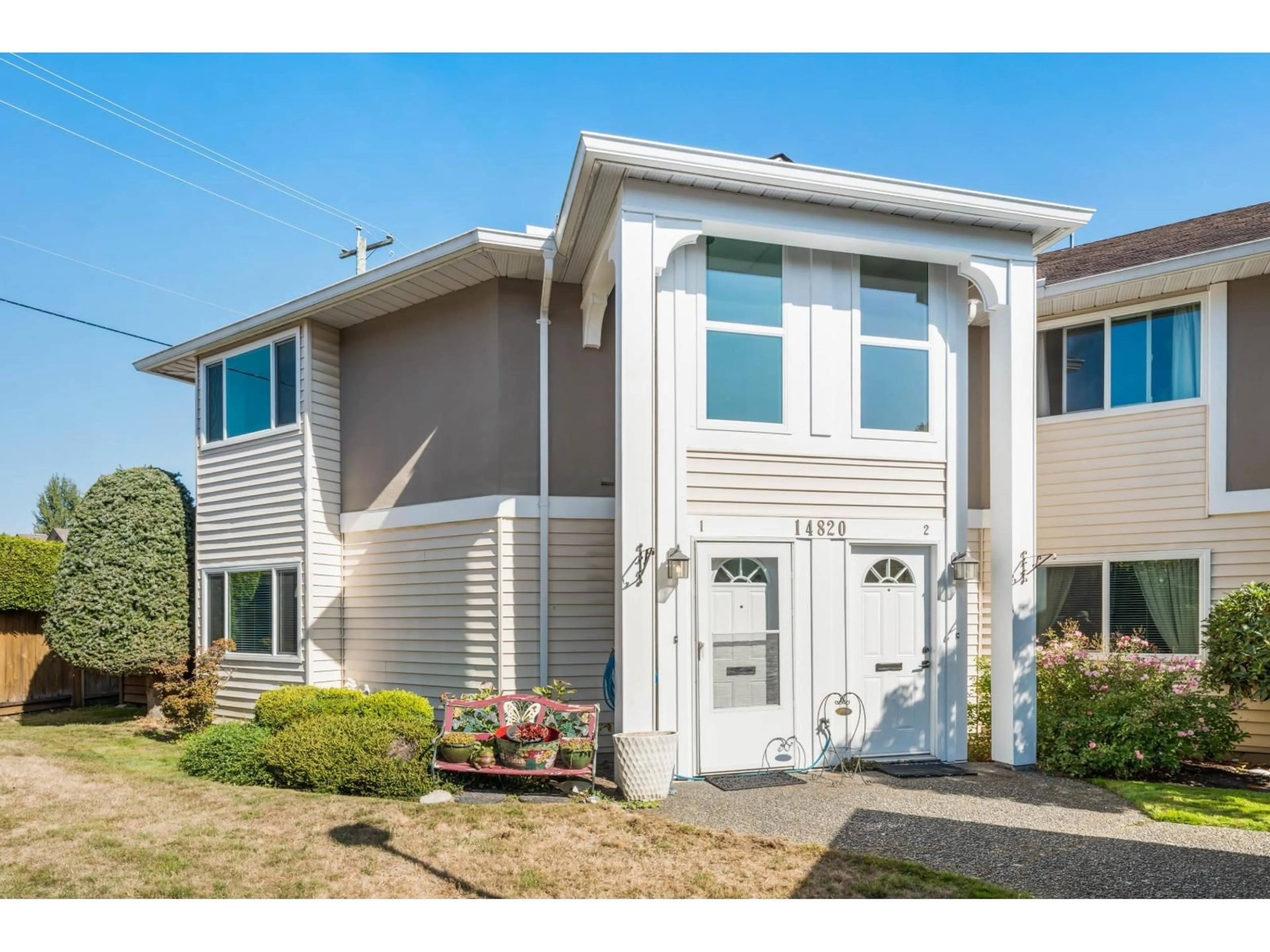 Home with vinyl exterior material, street for 1 - 14820 100, Surrey British Columbia V3R9A5
