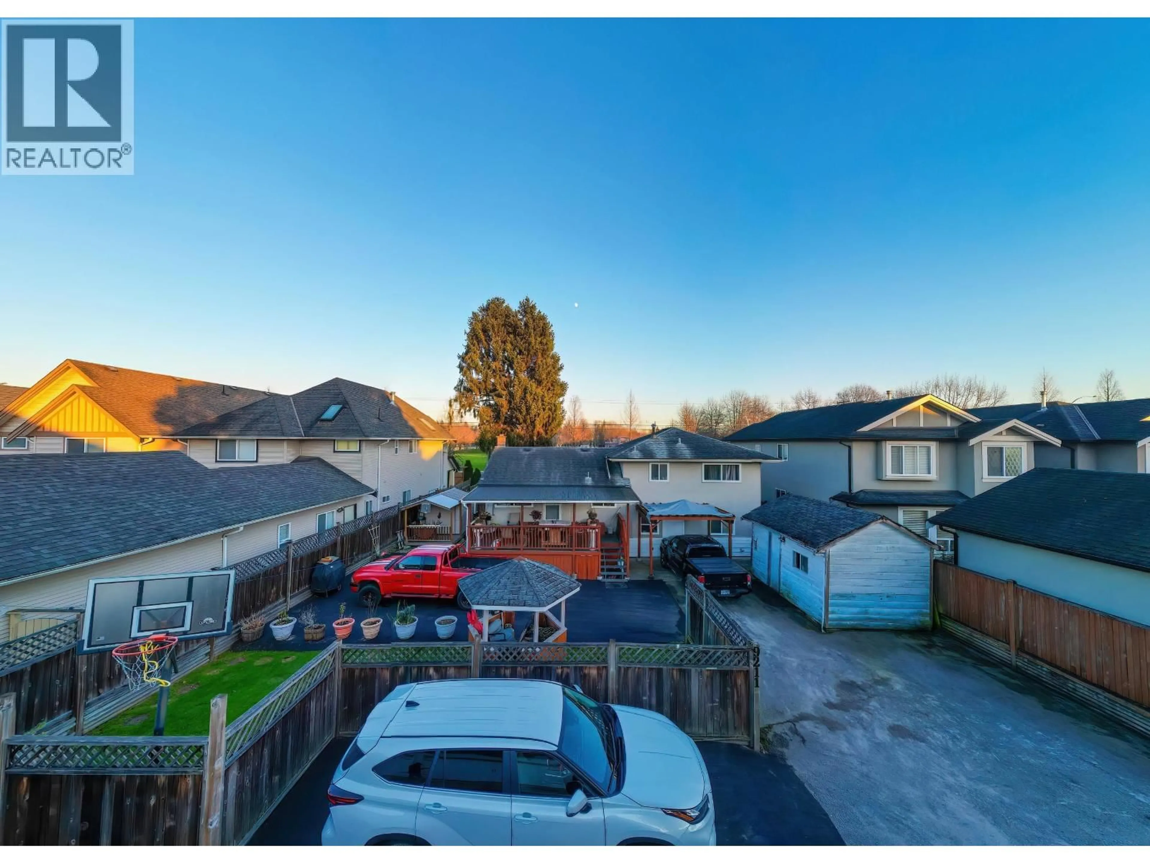 A pic from outside/outdoor area/front of a property/back of a property/a pic from drone, mountain view for 9211 NO. 1 ROAD, Richmond British Columbia V7E1R6