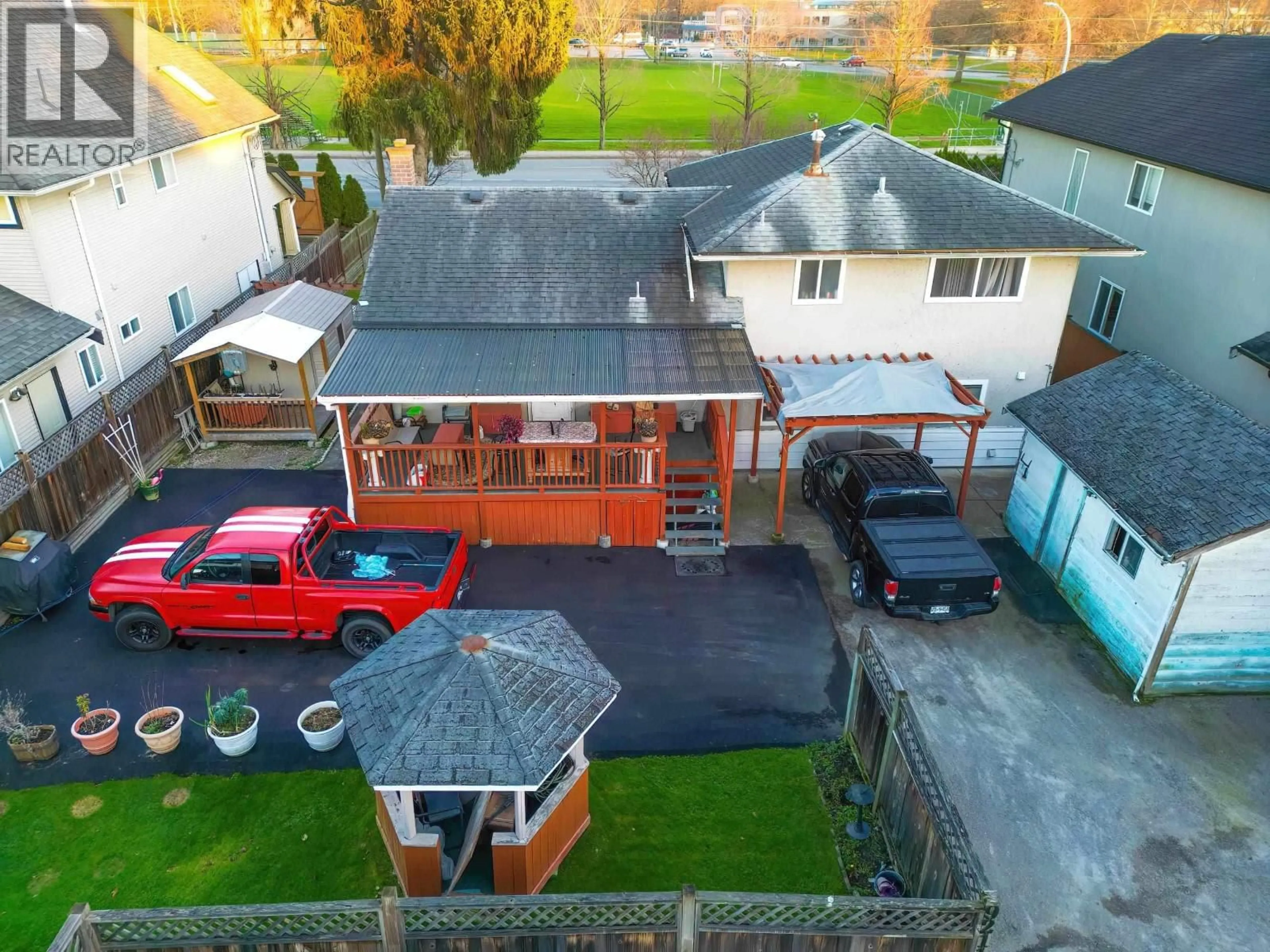 A pic from outside/outdoor area/front of a property/back of a property/a pic from drone, street for 9211 NO. 1 ROAD, Richmond British Columbia V7E1R6