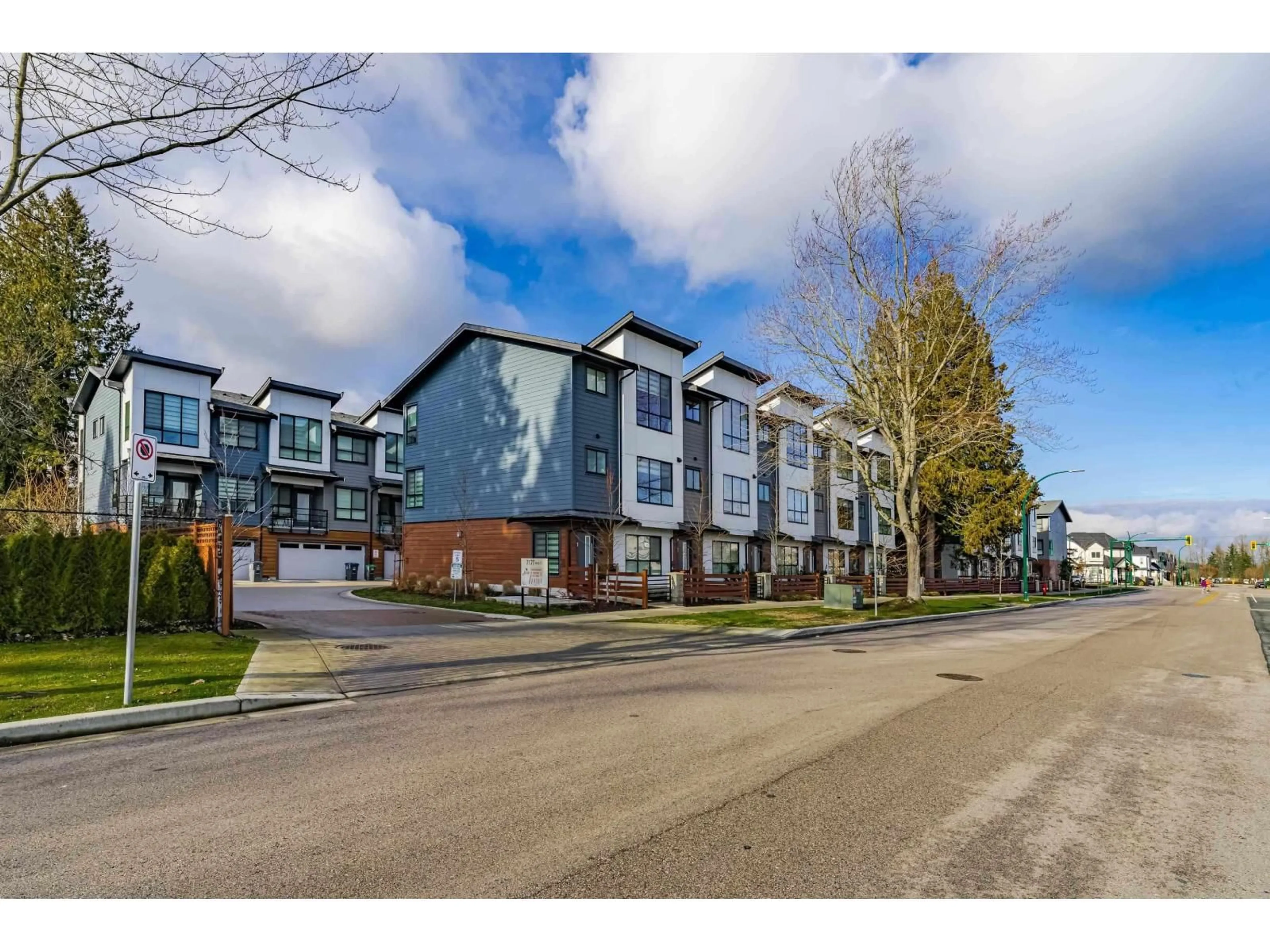A pic from outside/outdoor area/front of a property/back of a property/a pic from drone, street for 71 - 7177 194A, Surrey British Columbia V4N6V6