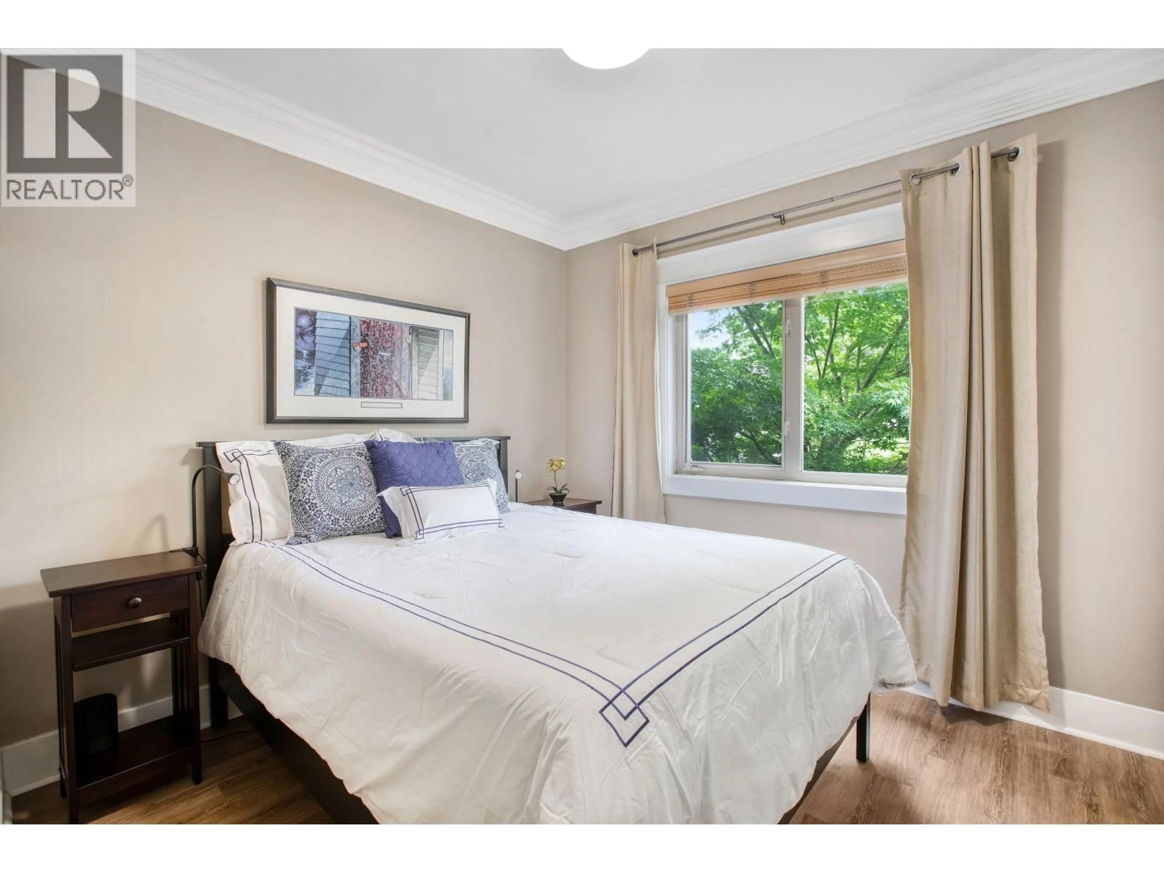 Bedroom with bed, wood/laminate floor for 1351 MAPLE STREET, Vancouver British Columbia V6J3S1