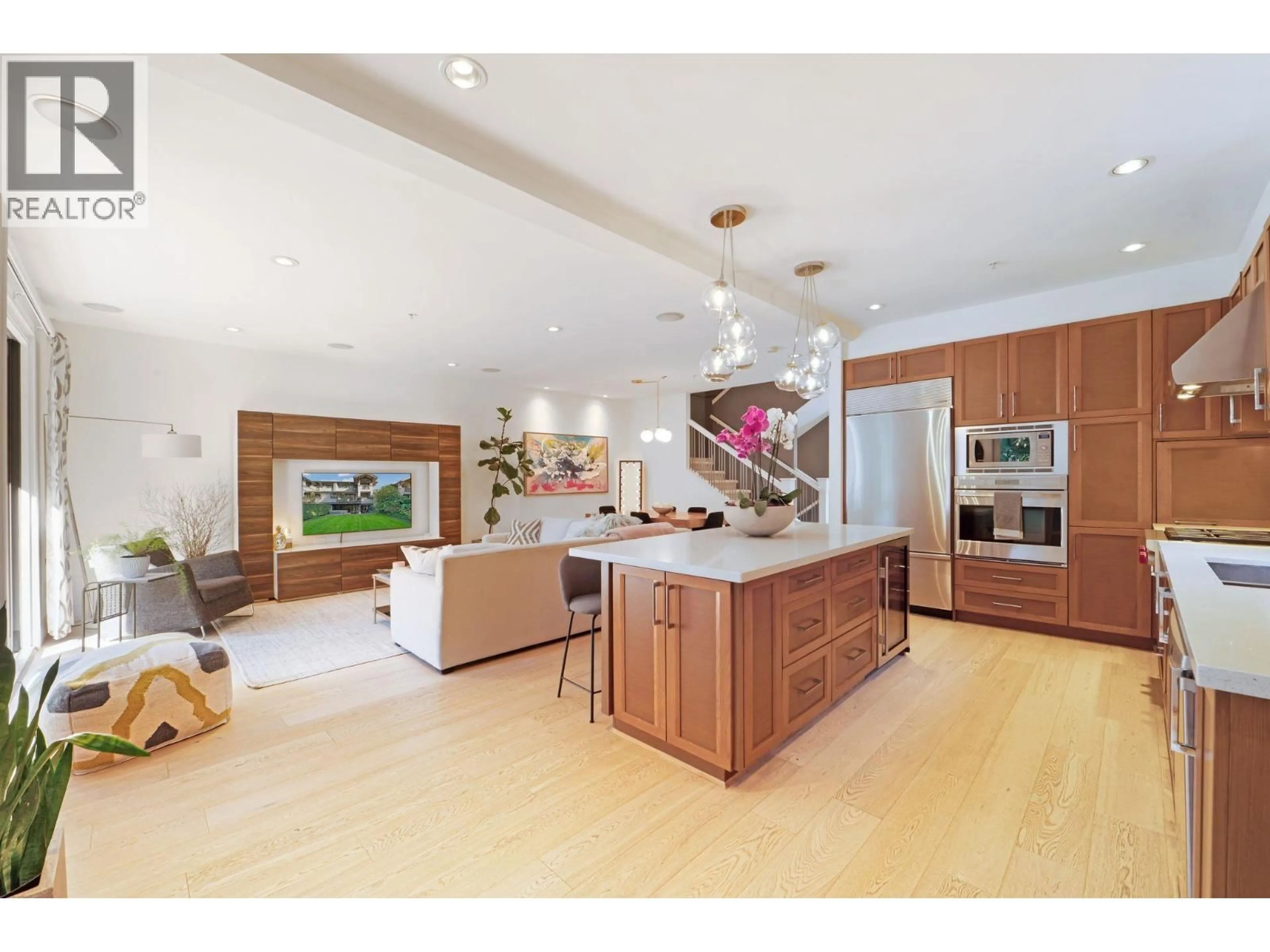 Open concept kitchen, wood/laminate floor for 20 - 555 RAVEN WOODS DRIVE, North Vancouver British Columbia V7G0A4