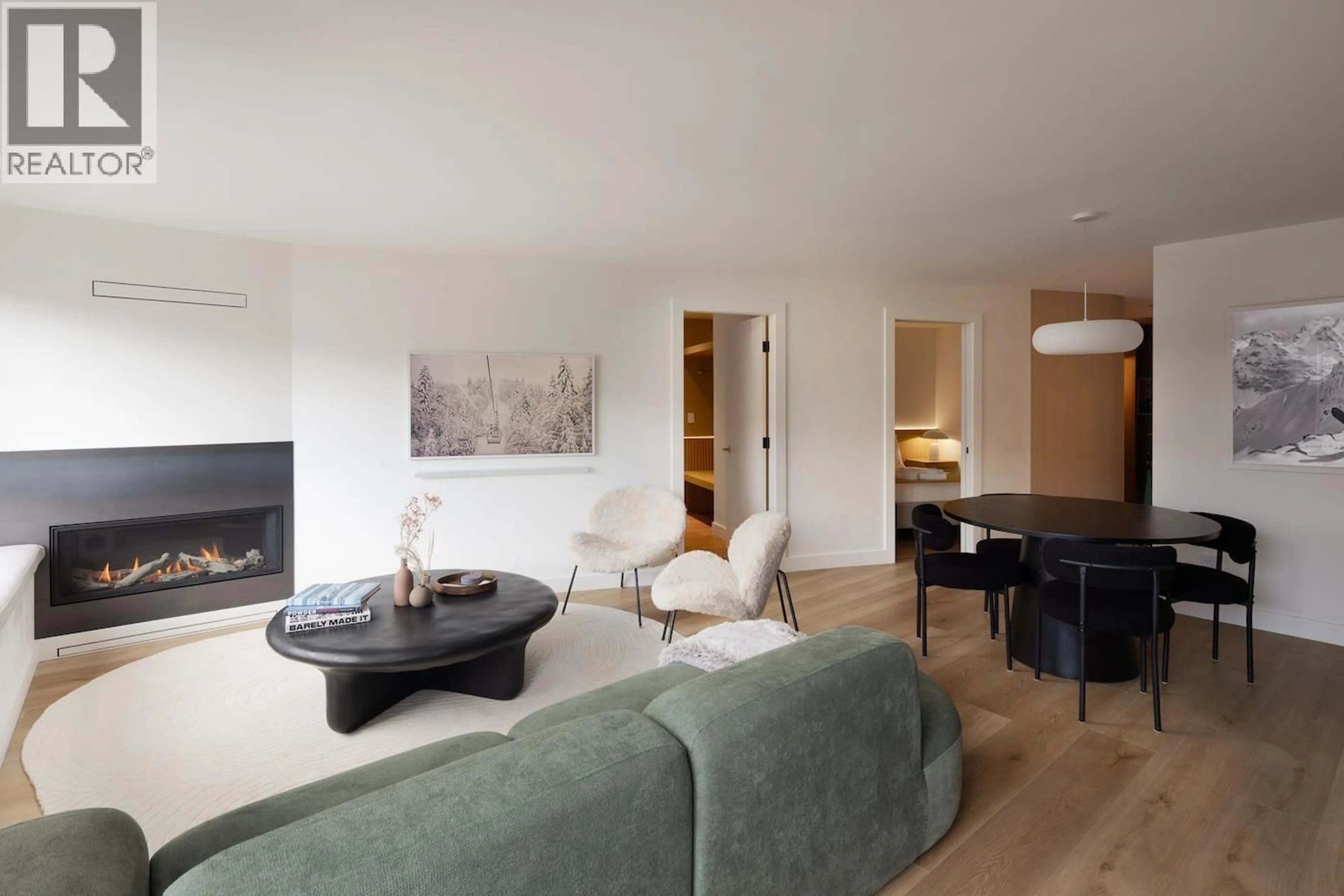Living room with furniture, wood/laminate floor for 215 - 4360 LORIMER ROAD, Whistler British Columbia V8E1A5