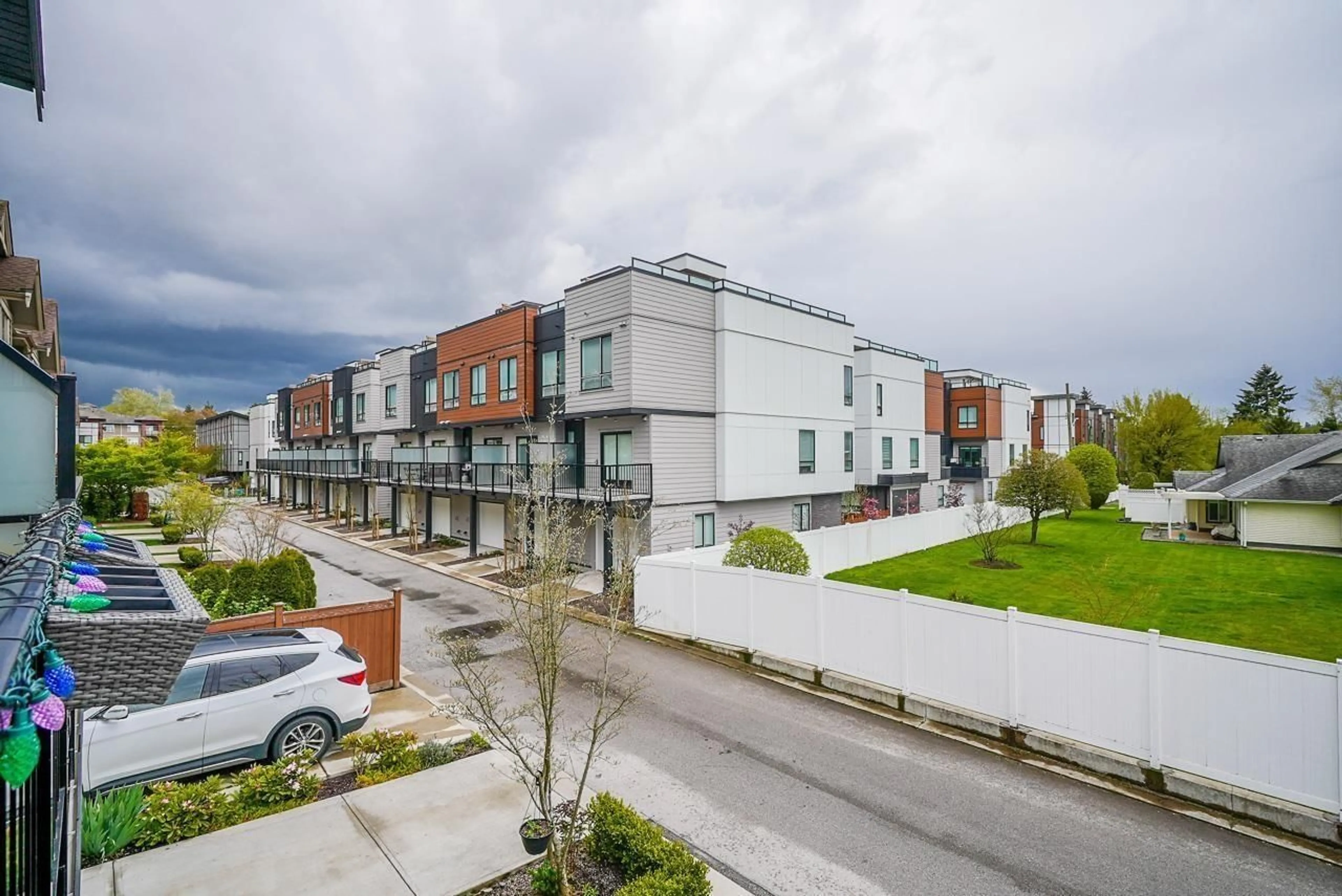 A pic from outside/outdoor area/front of a property/back of a property/a pic from drone, street for 26 - 19704 55A, Langley British Columbia V3A0L2