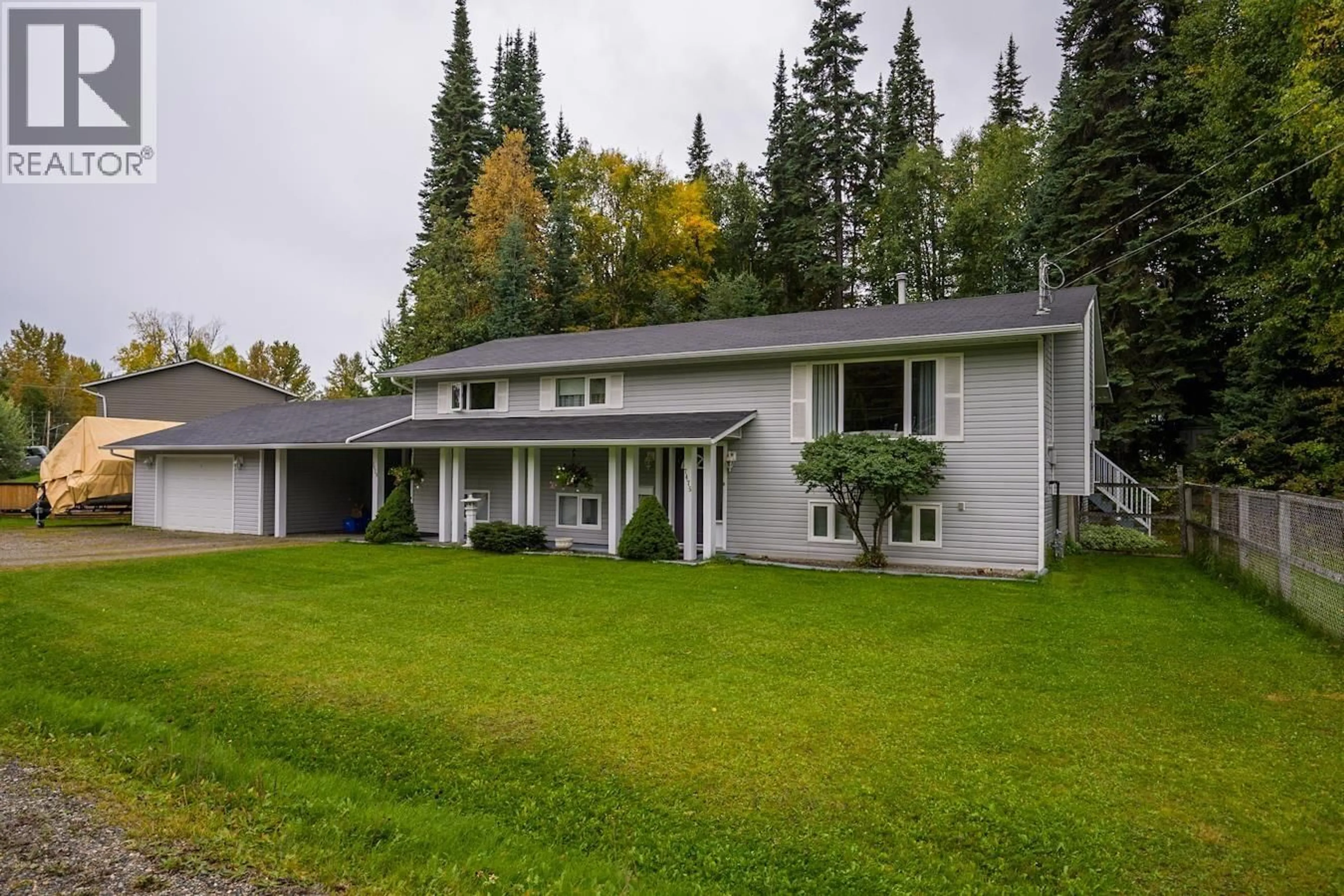 A pic from outside/outdoor area/front of a property/back of a property/a pic from drone, street for 7475 PEARL DRIVE, Prince George British Columbia V2K4K3