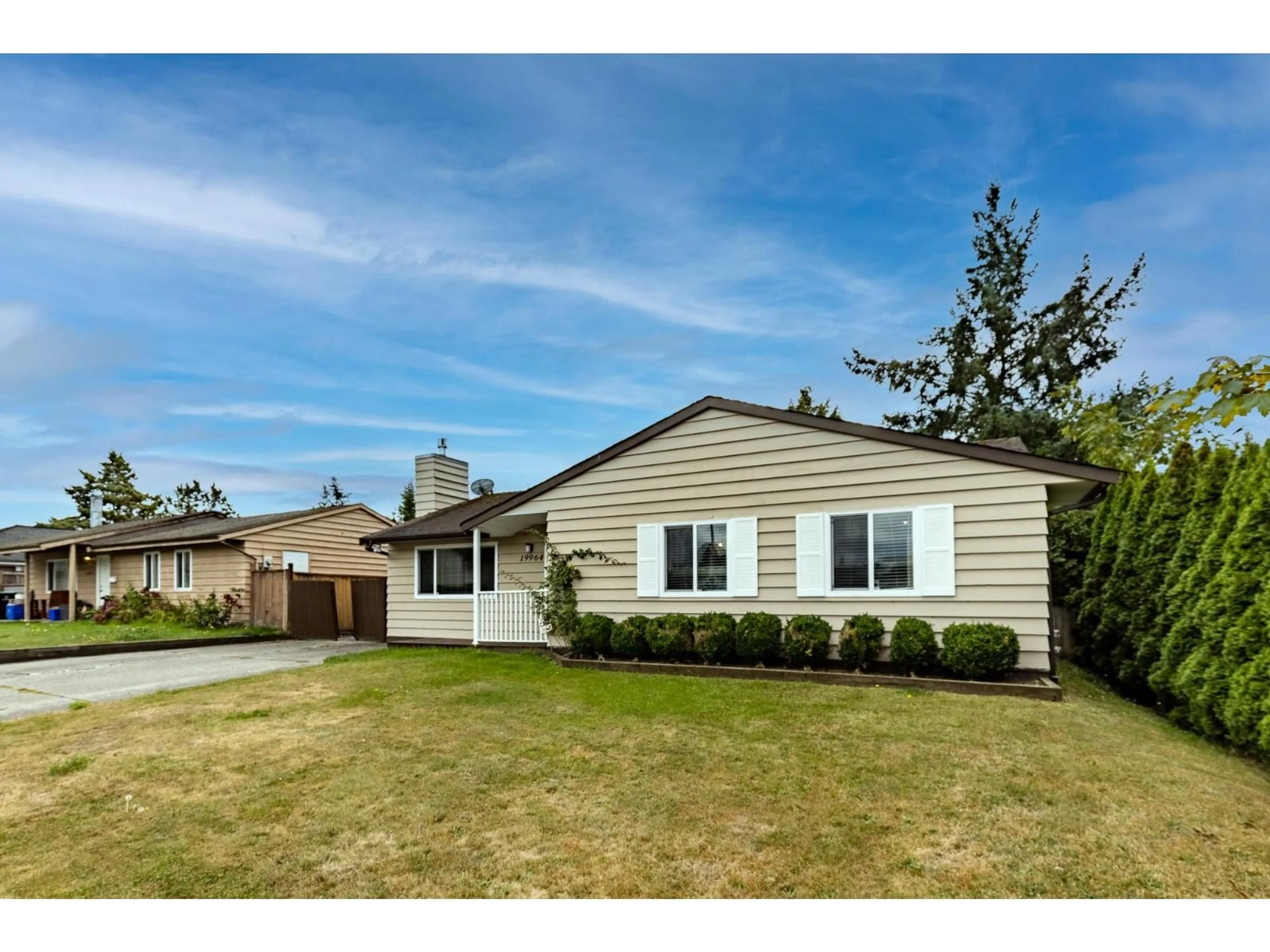 Home with vinyl exterior material, street for 19964 53, Langley British Columbia V3A6T4
