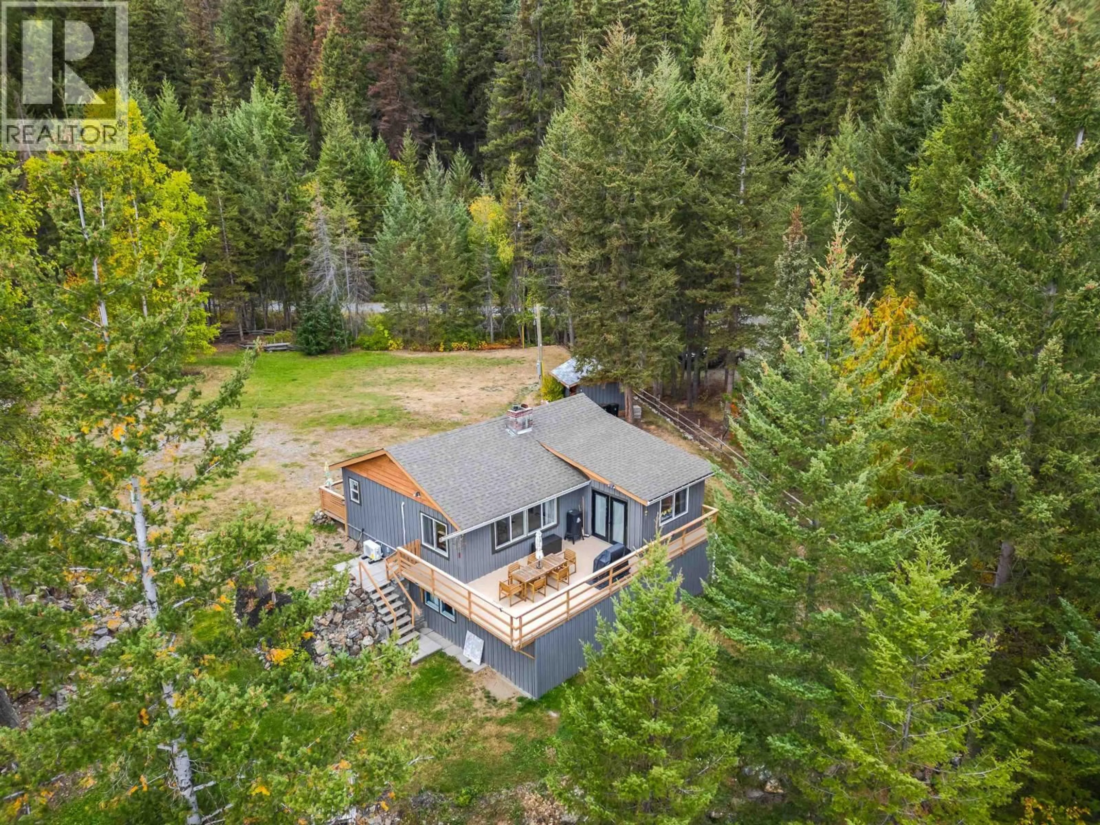 A pic from outside/outdoor area/front of a property/back of a property/a pic from drone, forest/trees view for 3825 CANIM-HENDRIX LAKE ROAD, Canim Lake British Columbia V0K1J0