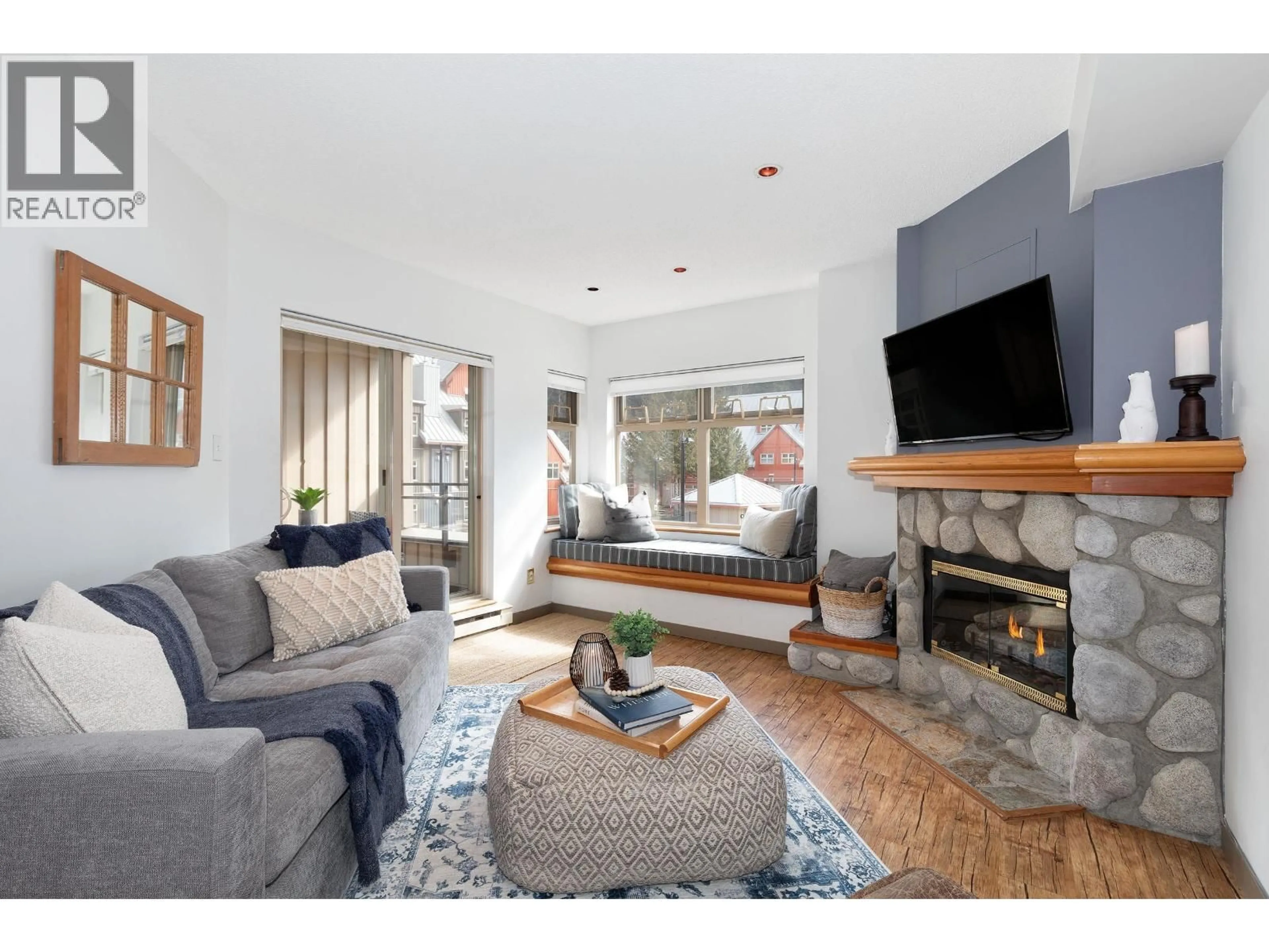Living room with furniture, unknown for 212 - 2050 LAKE PLACID ROAD, Whistler British Columbia V8E0A8