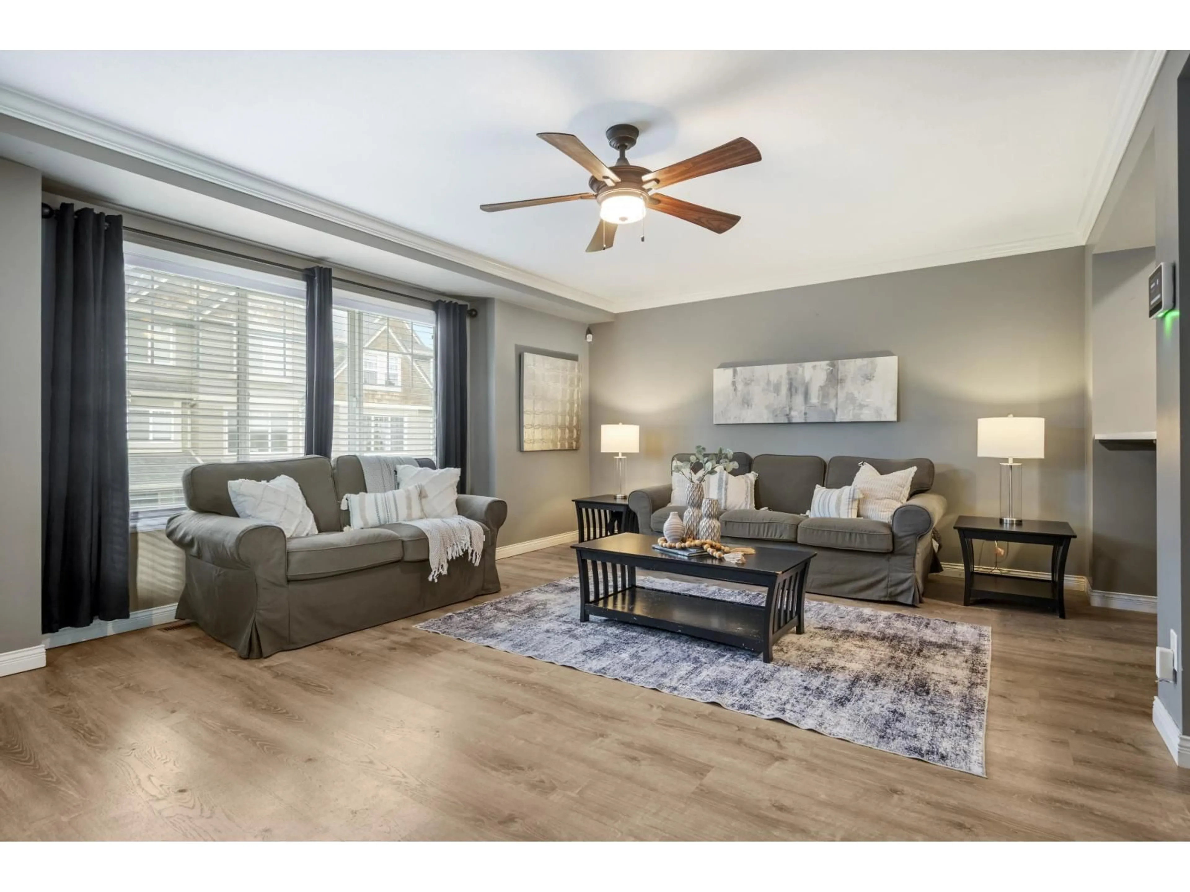 Living room with furniture, wood/laminate floor for 16 - 8830 NOWELL STREET, Chilliwack British Columbia V2P0A6