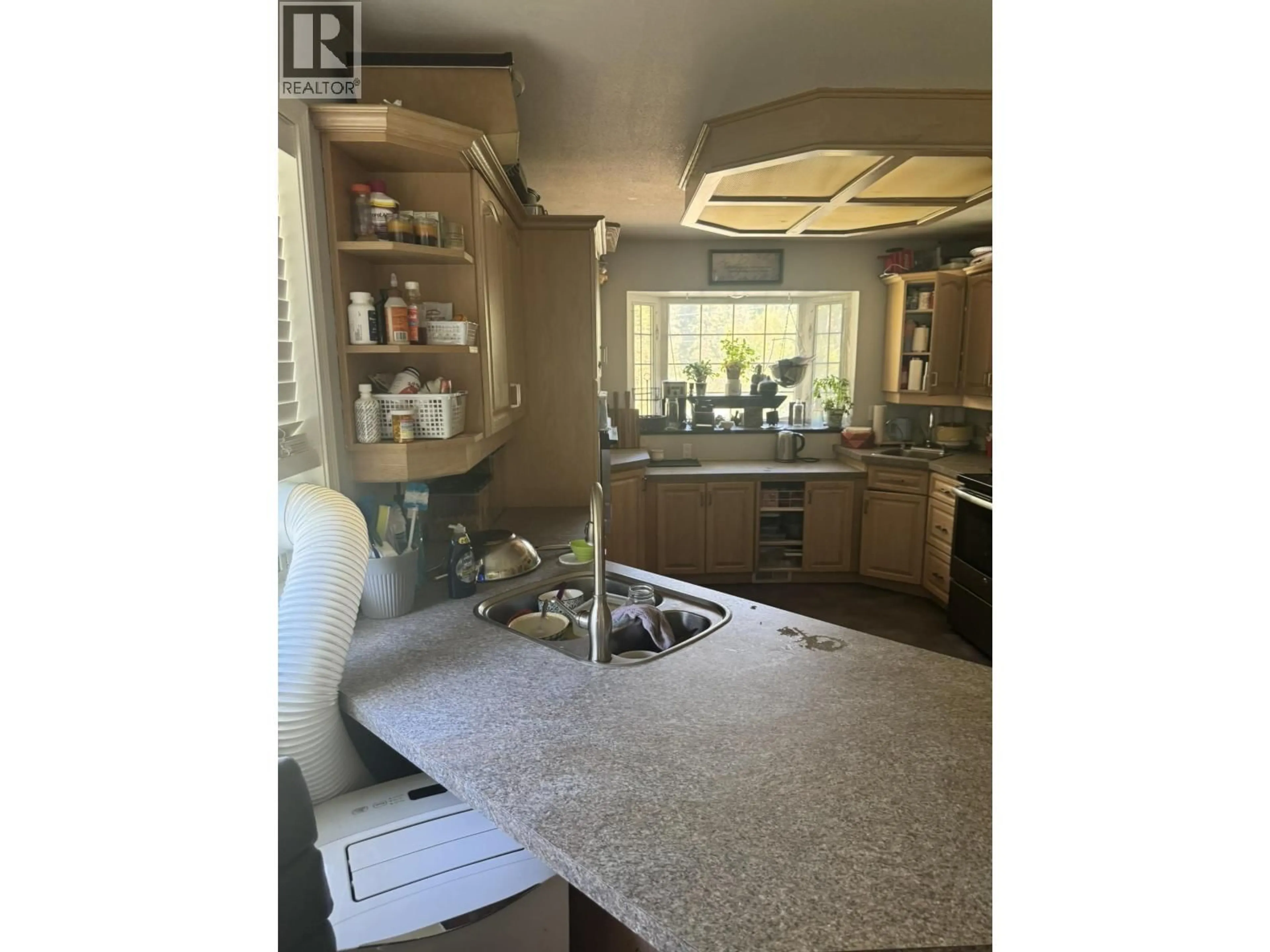 Open concept kitchen, ceramic/tile floor for 1715 DAVID DRIVE, Prince George British Columbia V2N6V7