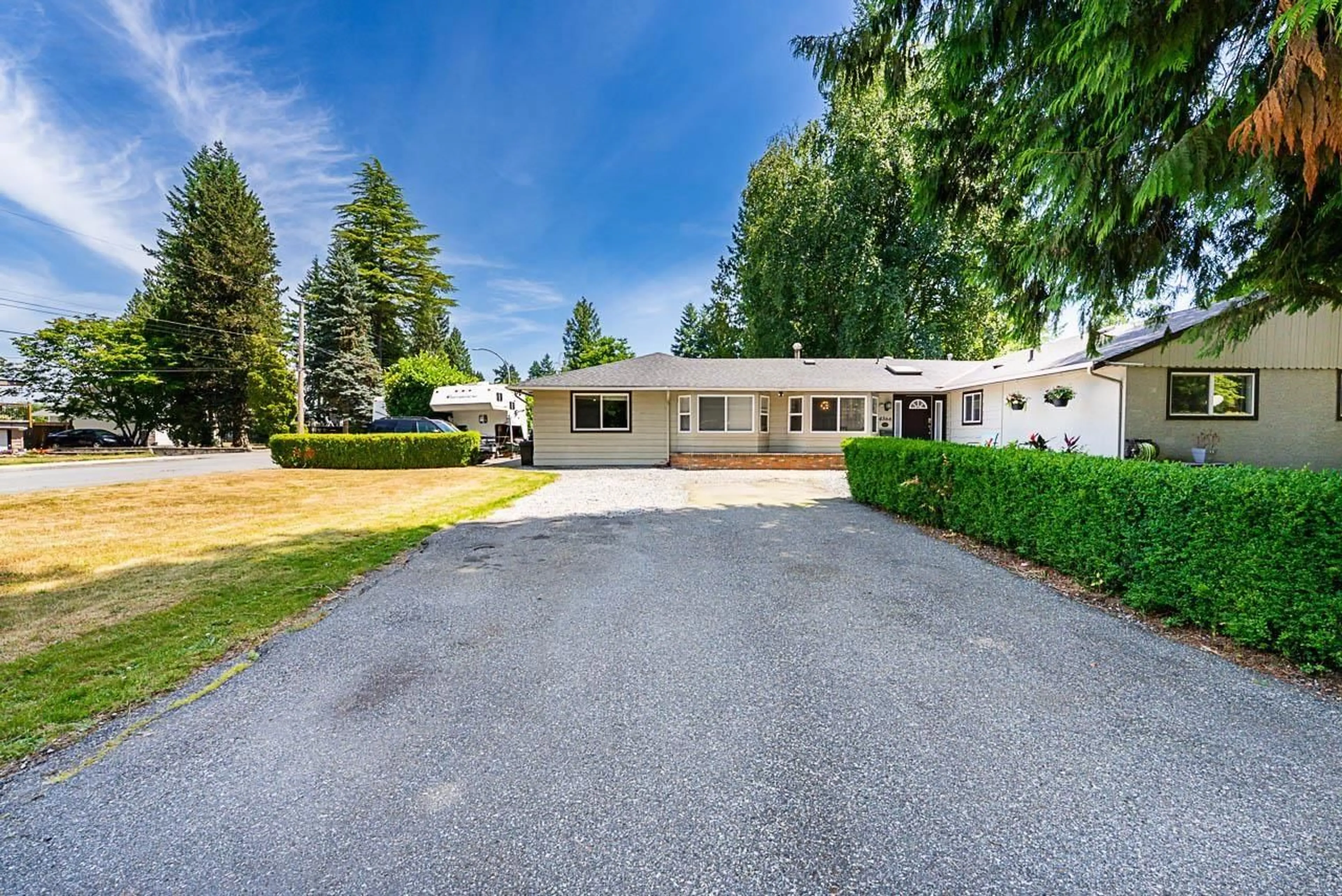 A pic from outside/outdoor area/front of a property/back of a property/a pic from drone, street for 4566 206A, Langley British Columbia V3A2C8
