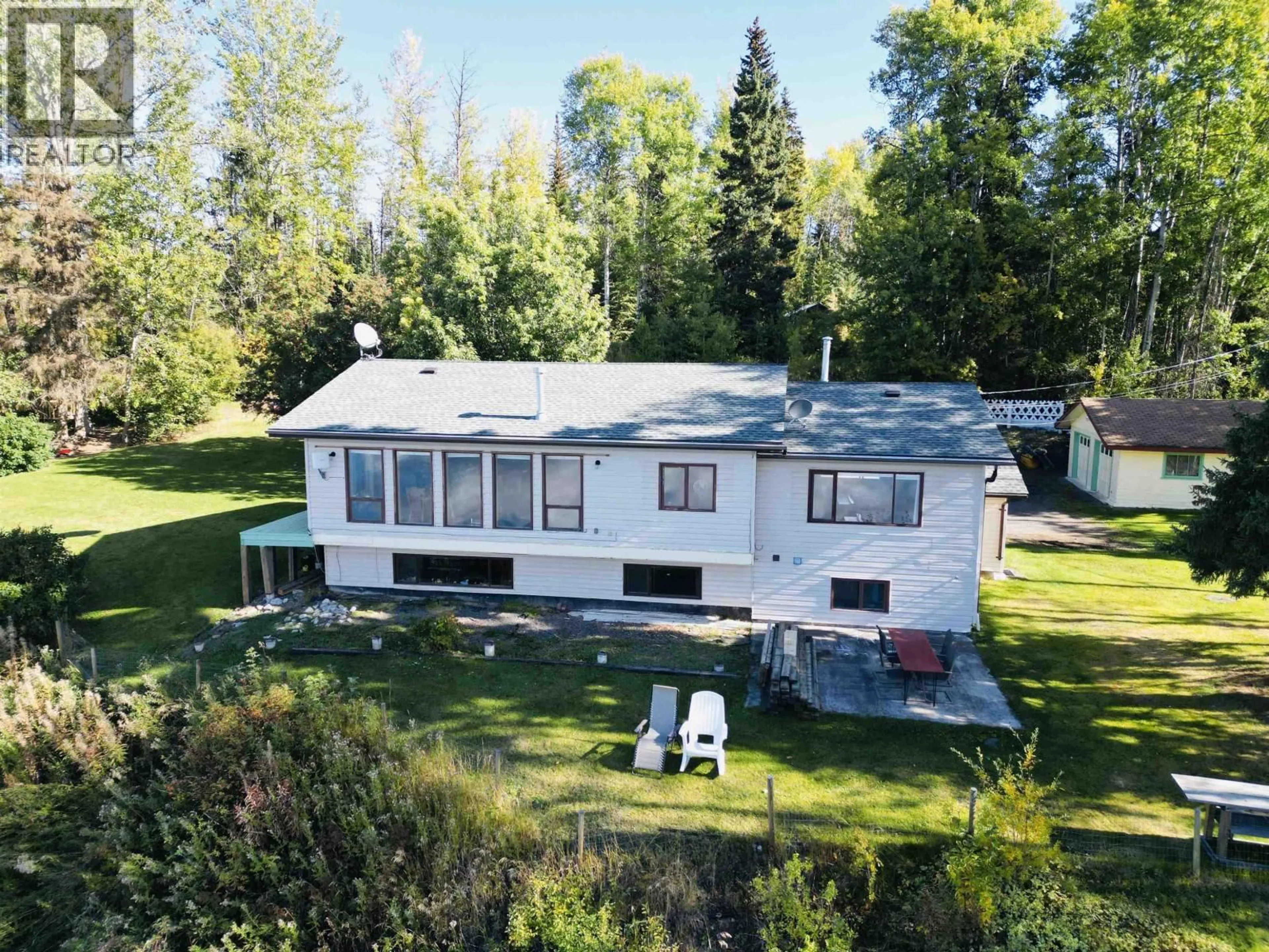 A pic from outside/outdoor area/front of a property/back of a property/a pic from drone, unknown for 8003 ROWLAND ROAD, Burns Lake British Columbia V0J1E1