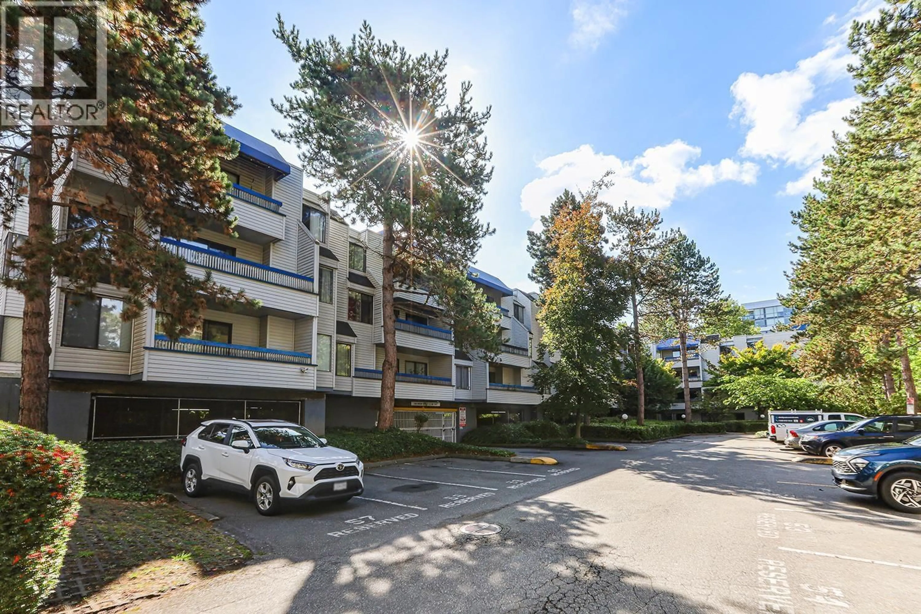 A pic from outside/outdoor area/front of a property/back of a property/a pic from drone, street for 106 - 5800 COONEY ROAD, Richmond British Columbia V6X3A8
