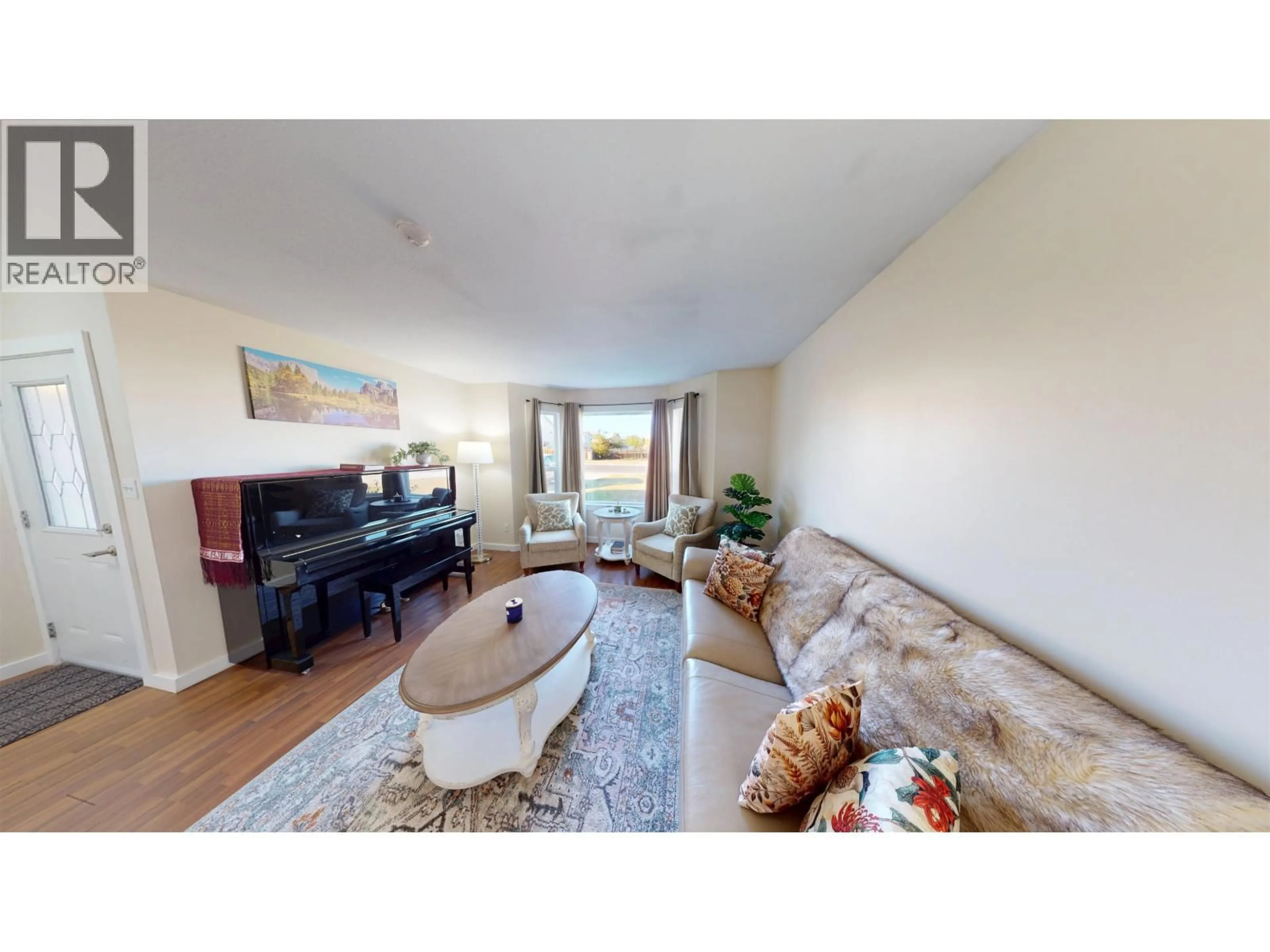 Living room with furniture, unknown for 8019 89 AVENUE, Fort St. John British Columbia V1J6V6