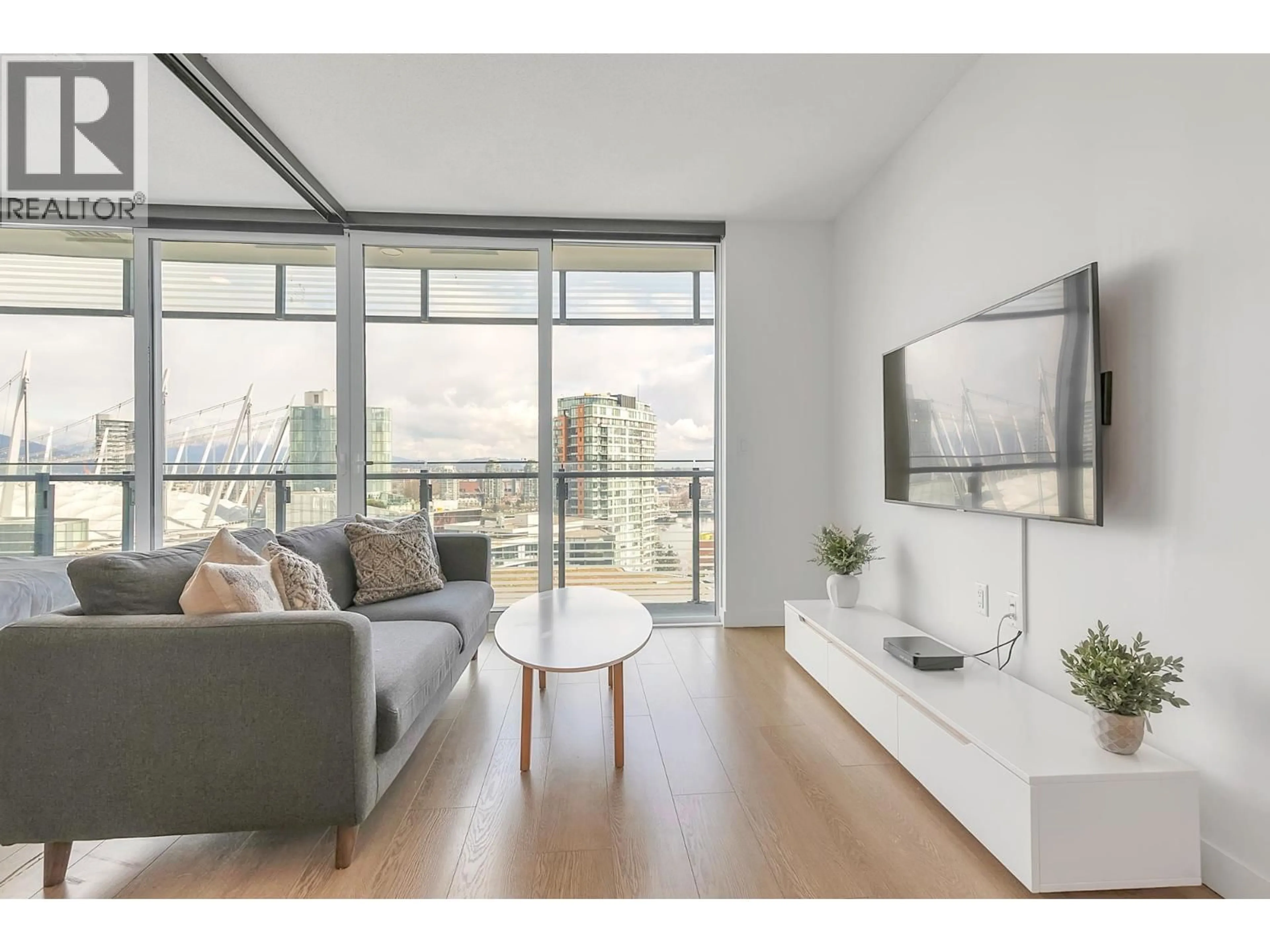 Living room with furniture, wood/laminate floor for 2212 - 89 NELSON STREET, Vancouver British Columbia V6Z0E7