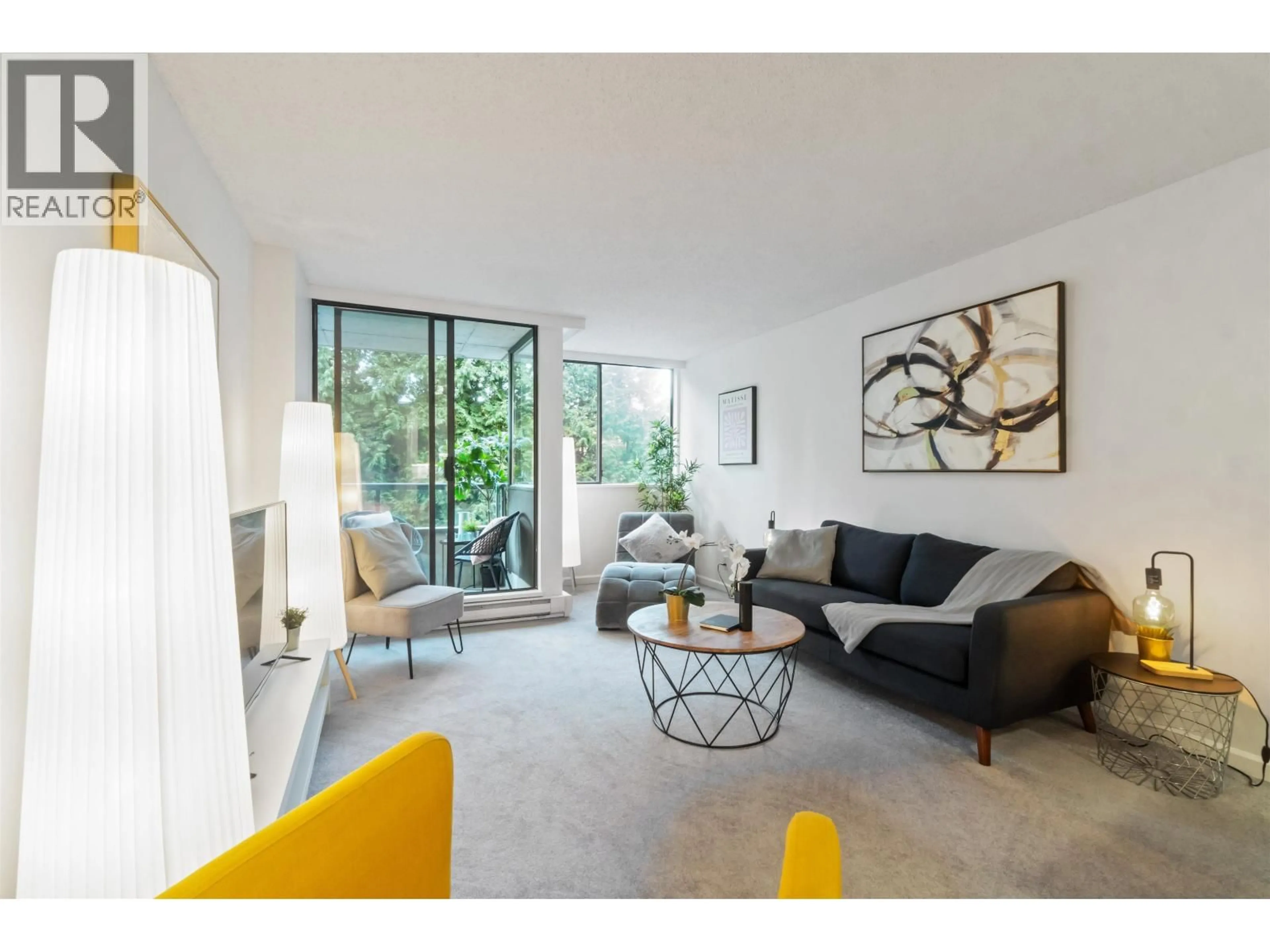 Living room with furniture, unknown for 305 - 3970 CARRIGAN COURT, Burnaby British Columbia V3N4S5
