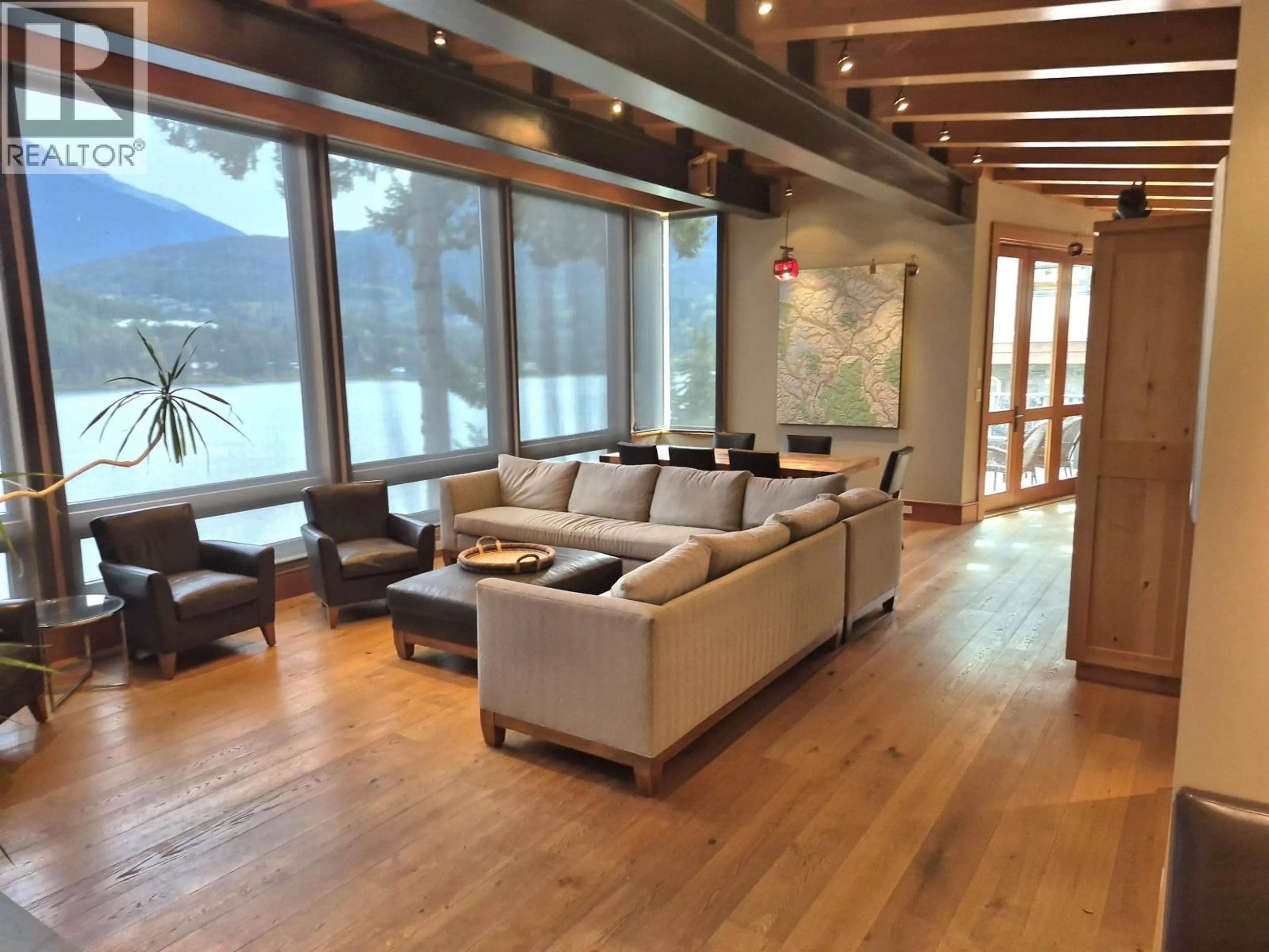 Living room with furniture, wood/laminate floor for 5714 ALTA LAKE ROAD, Whistler British Columbia V8E0C3