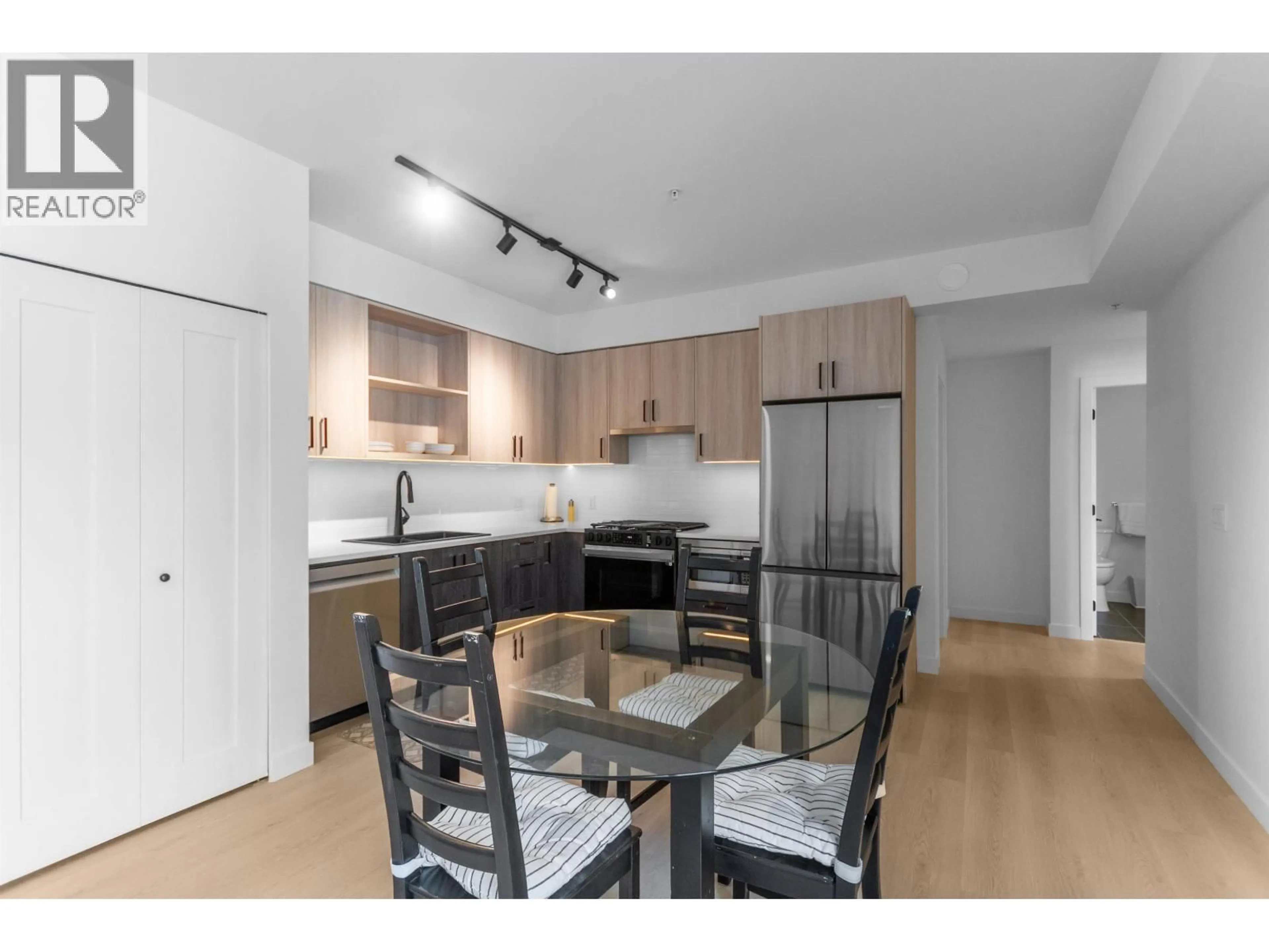 Open concept kitchen, wood/laminate floor for 606 - 2002 ST. GEORGE STREET, Port Moody British Columbia V3H0N4