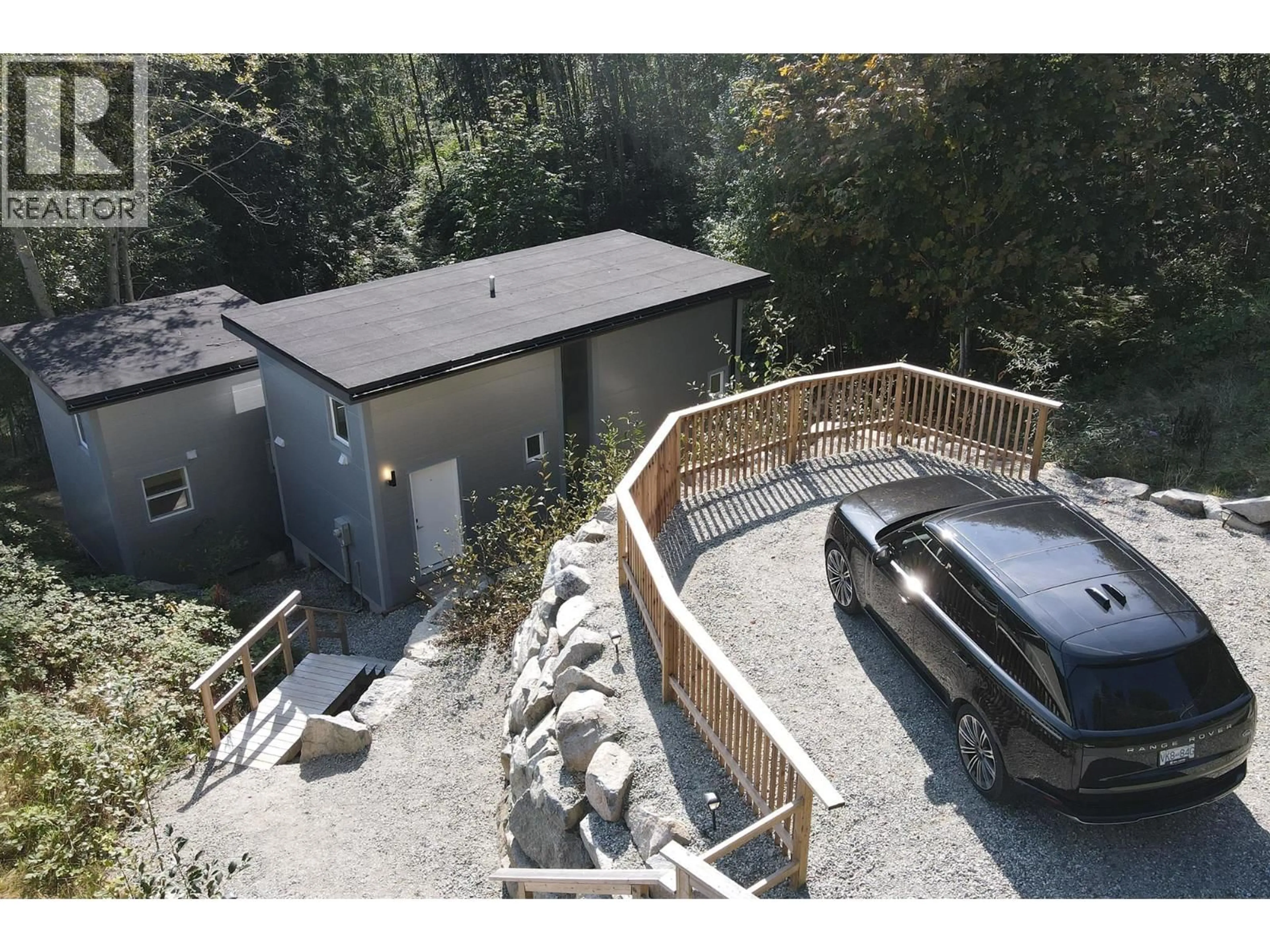 A pic from outside/outdoor area/front of a property/back of a property/a pic from drone, unknown for 5977 SHOAL WAY, Sechelt British Columbia V7Z0R1